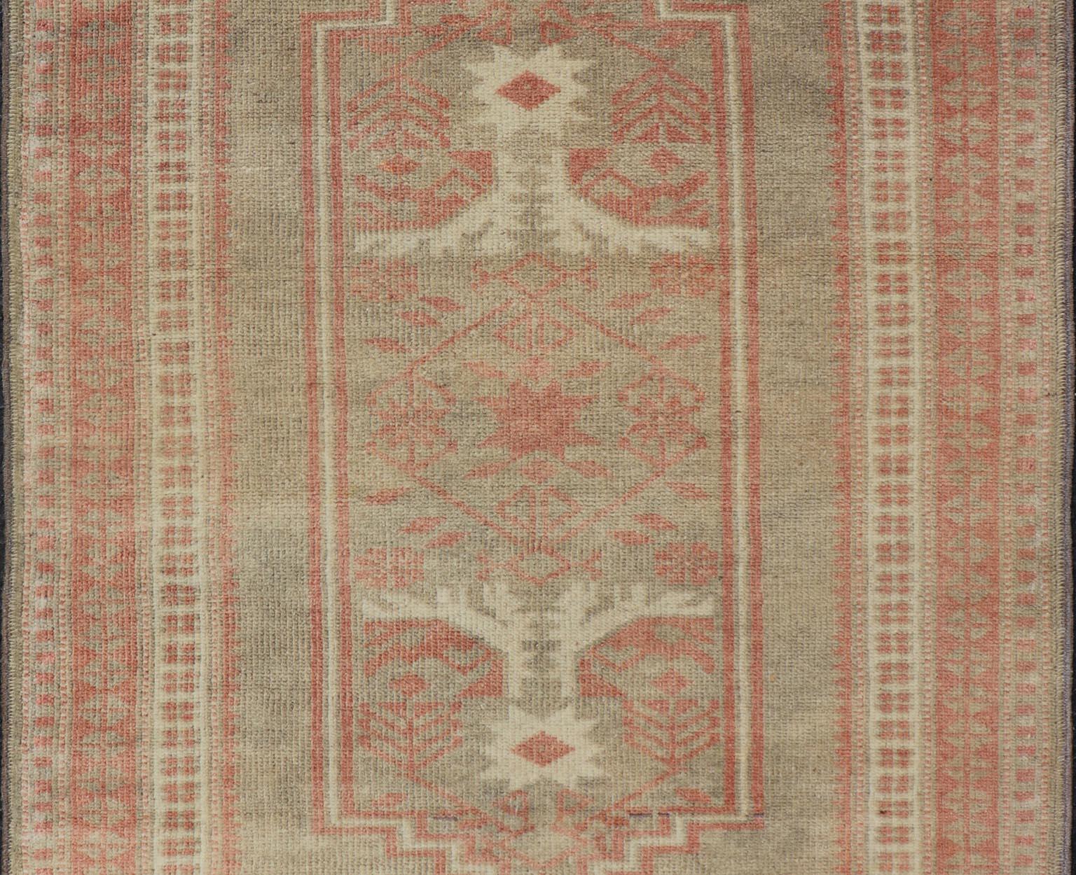 Hand-Knotted Vintage Turkish Oushak Rug with Geometric Design in Soft Red, and Light Green  For Sale