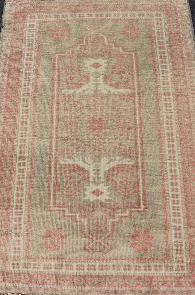 20th Century Vintage Turkish Oushak Rug with Geometric Design in Soft Red, and Light Green  For Sale
