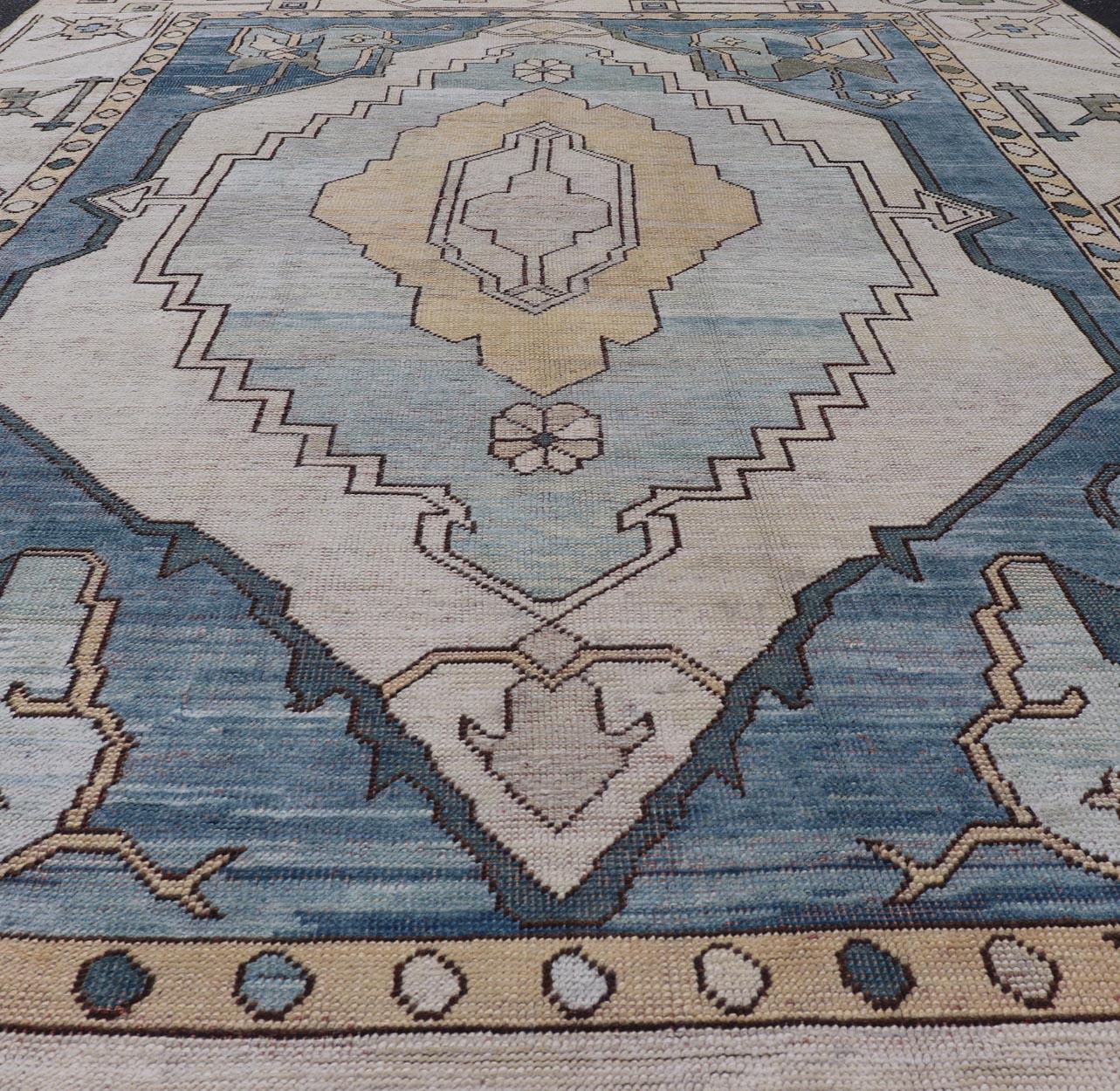 Hand-Knotted Vintage Turkish Oushak Rug with Geometric Medallion & Tribal Design For Sale