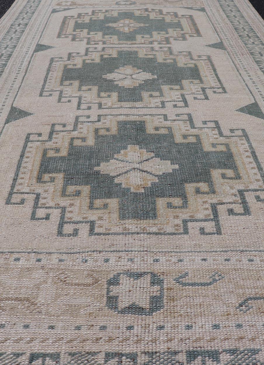 Hand-Knotted Vintage Turkish Oushak Rug With Geometric Medallions in Soft Green  3'3 x 6'1