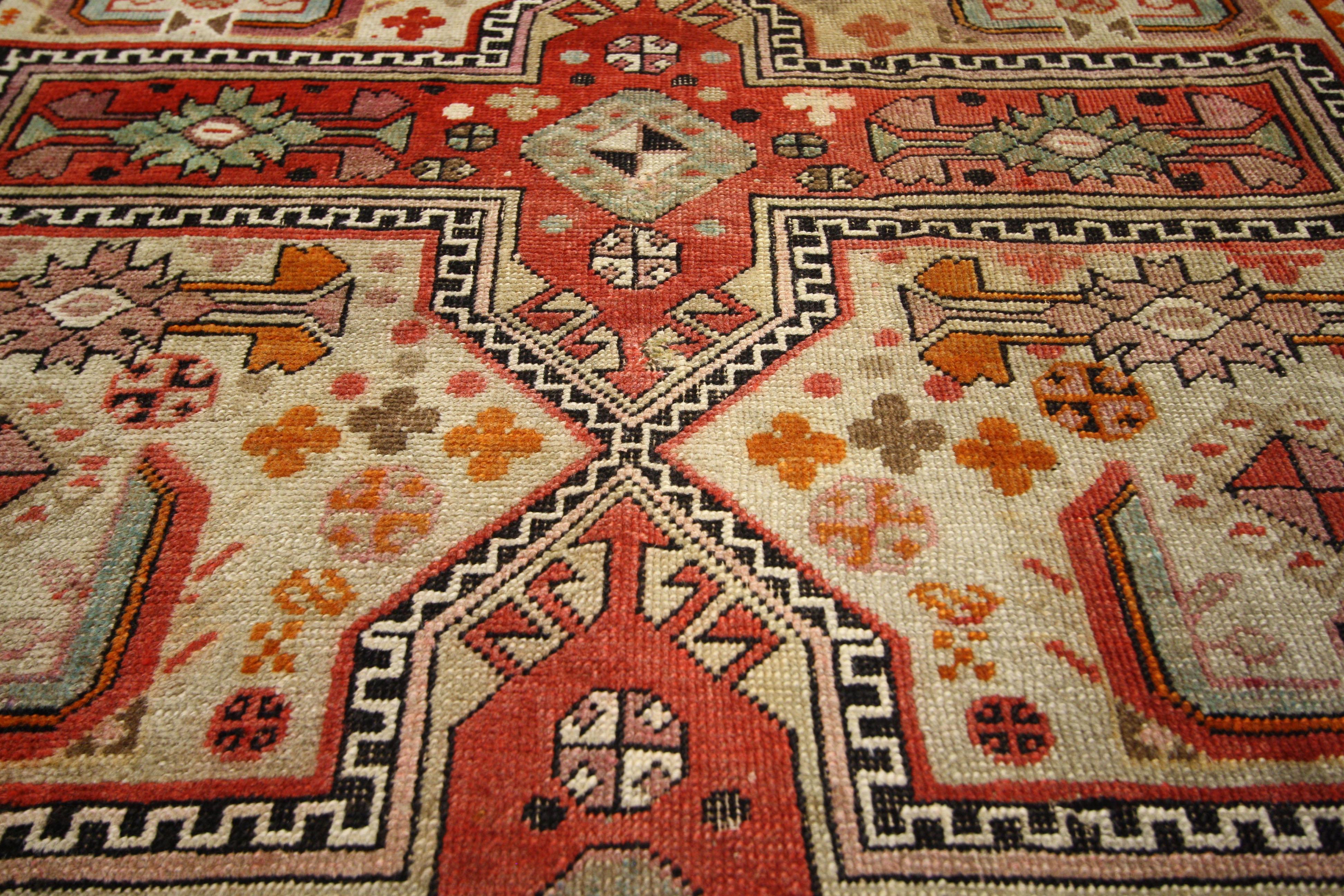52327, vintage Turkish Oushak rug with Jacobean style, kitchen, foyer or entry rug. Tribal vibes, whimsy and rich colors collide in this hand knotted wool vintage Turkish Oushak with Jacobean style. Three stacked rectangular cruciform medallions