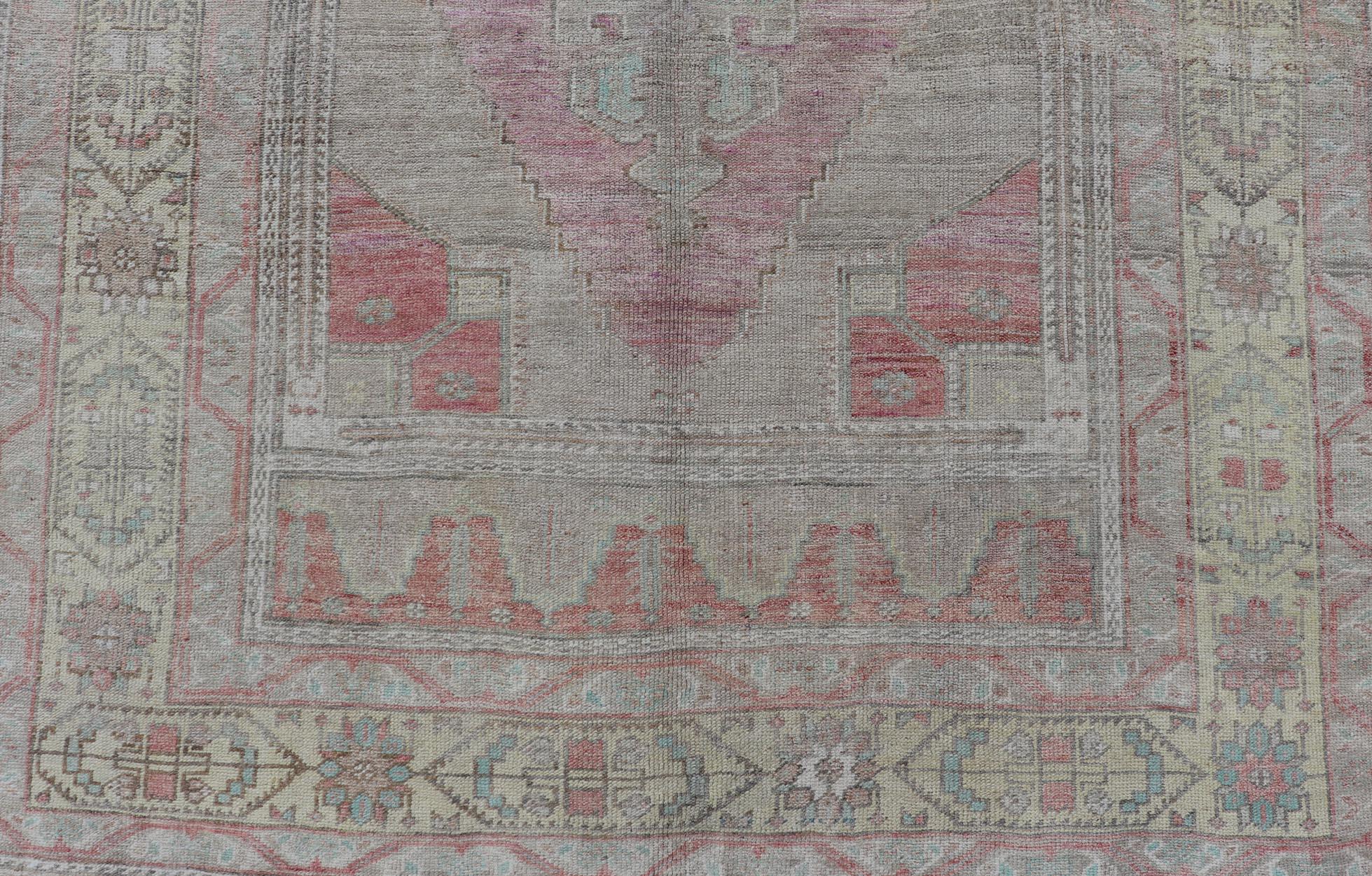 Wool Vintage Turkish Oushak Rug with Layered Medallion Design For Sale