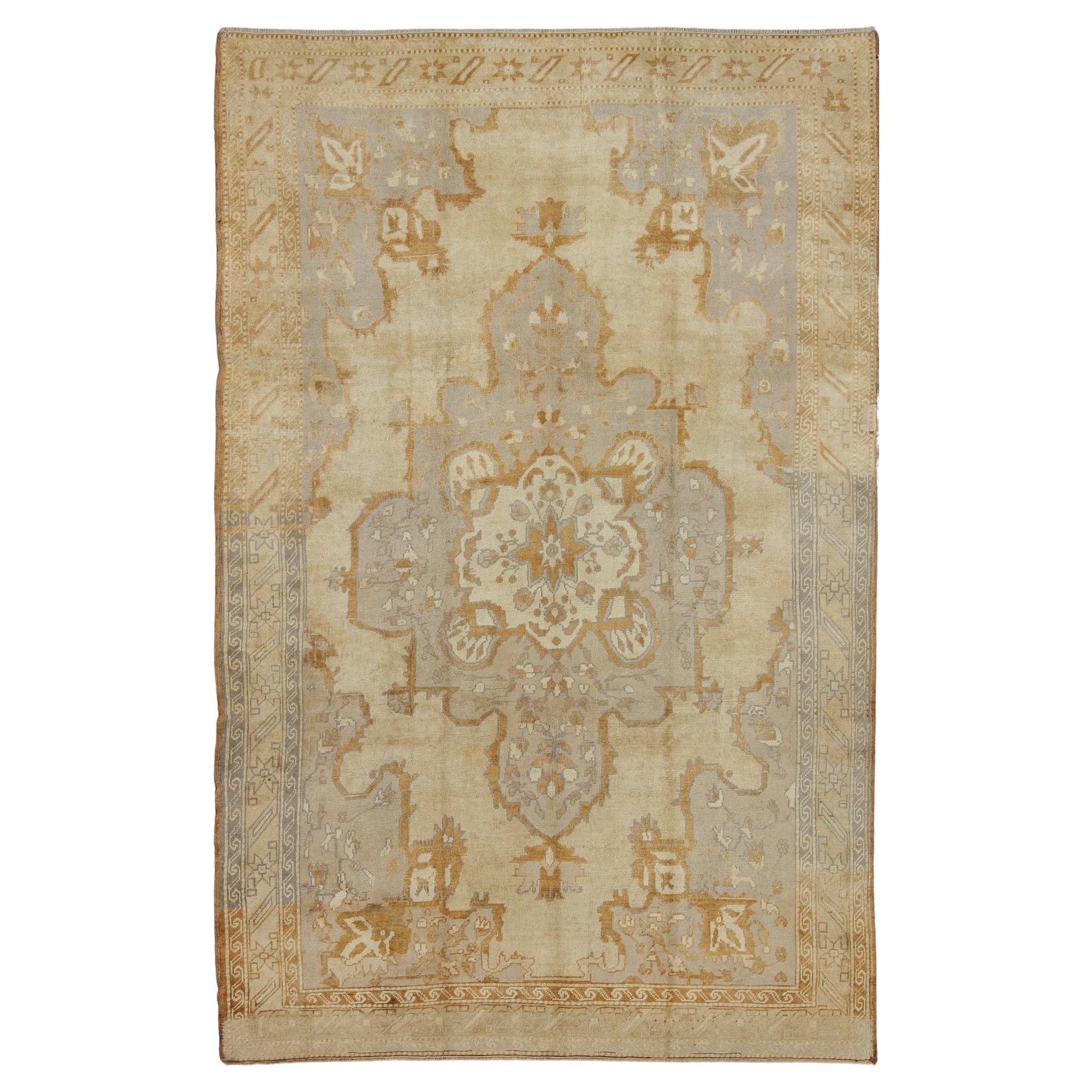 Vintage Turkish Oushak Rug with Medallion Design and Corniced Floral Border For Sale