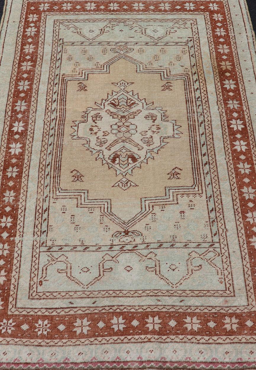 Wool Vintage Turkish Oushak Rug with Medallion Design in Camel, Taupe, and Light Blue For Sale