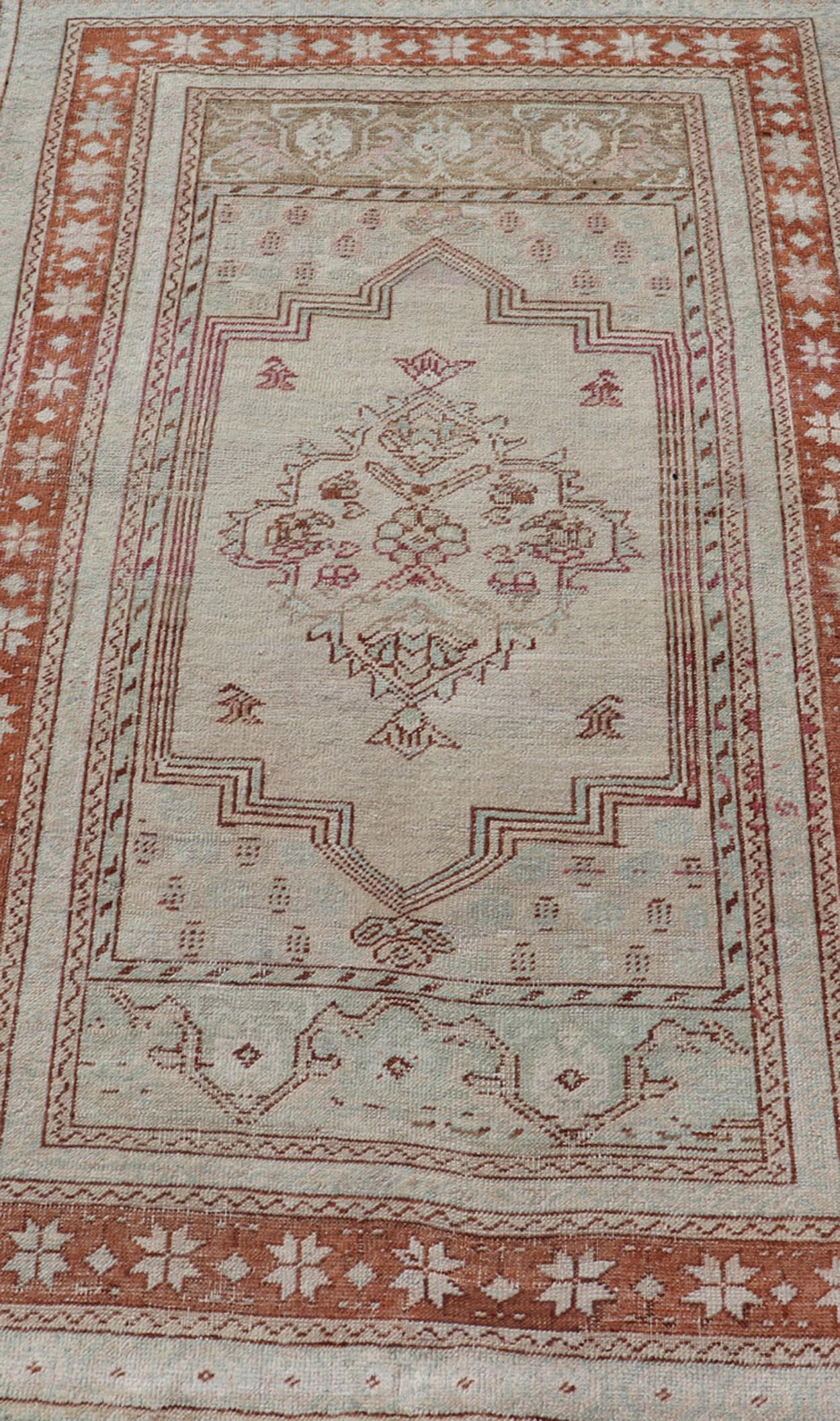 Vintage Turkish Oushak Rug with Medallion Design in Taupe, Light Green, & Brown In Good Condition For Sale In Atlanta, GA