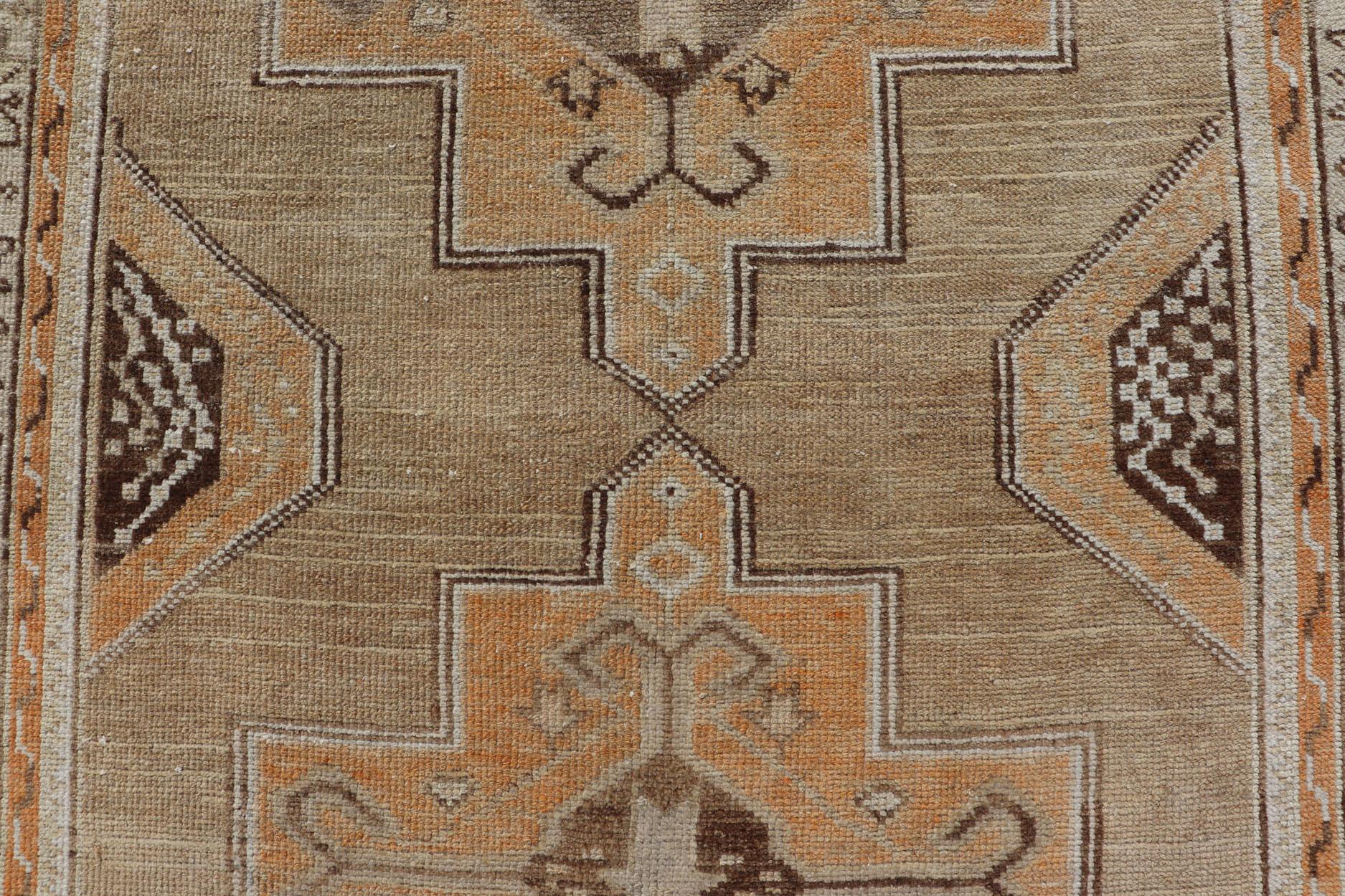 Vintage Turkish Oushak Rug With Medallions in Earthy Color Tones with Orange In Good Condition For Sale In Atlanta, GA