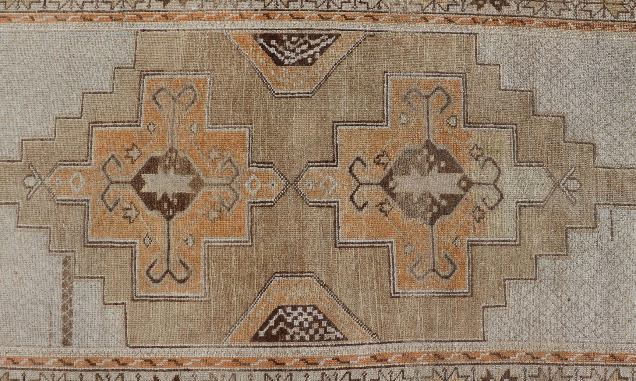 20th Century Vintage Turkish Oushak Rug With Medallions in Earthy Color Tones with Orange For Sale