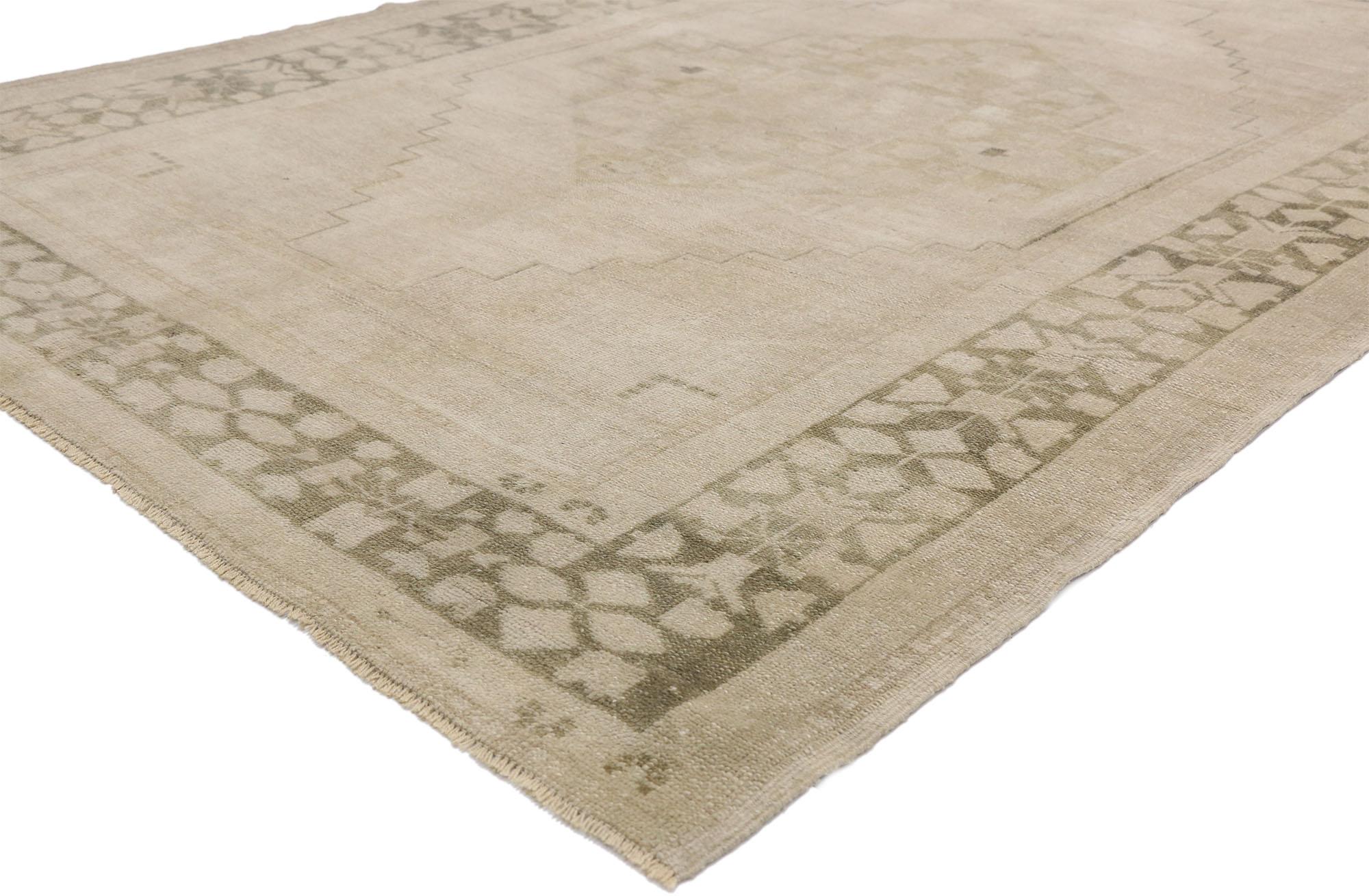 52483, vintage Turkish Oushak rug with Mission style and faded, neutral colors. This hand knotted wool vintage Turkish Oushak rug with Mission style welcomes guests with warmth and sophistication. This gorgeous Vintage Turkish Oushak Rug displays a