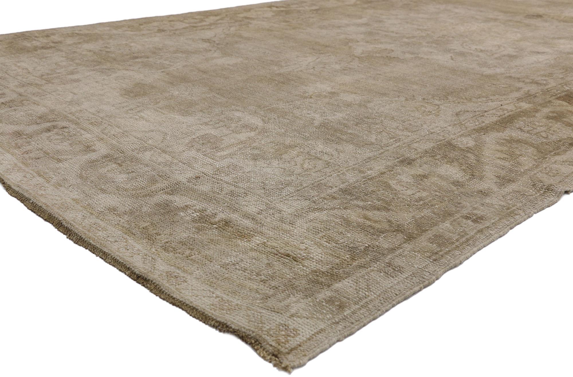 52484 vintage Turkish Oushak rug with Mission style and French Romanticism. Featuring an intimate patina with generous authentic abrash gradations, this hand knotted wool vintage Turkish Oushak rug with Mission style recalls a bygone era of romance,