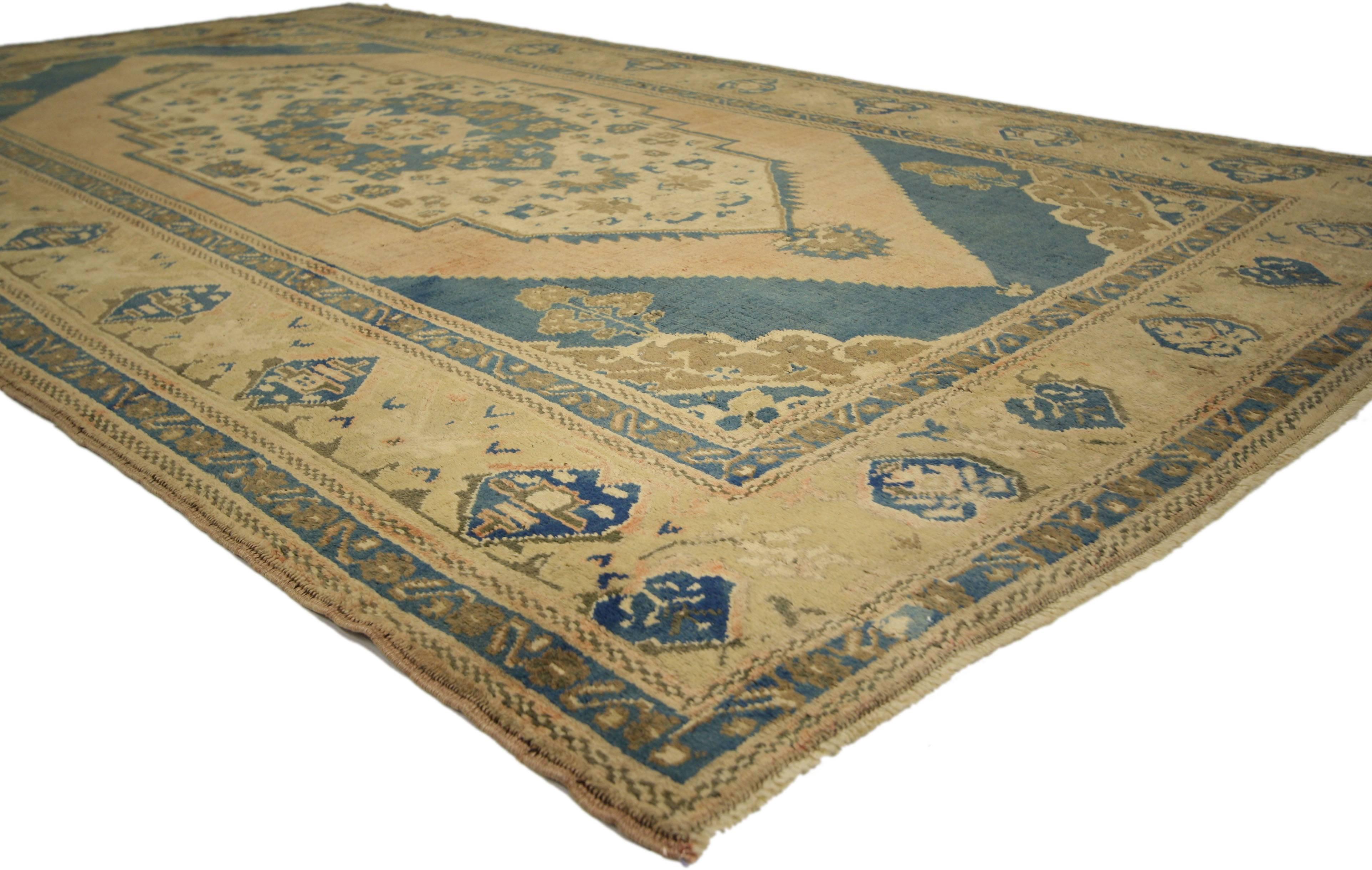 74096 Vintage Turkish Oushak Rug with Modern Design and Cerulean Blue Field. This vintage Turkish Oushak carpet runner (or gallery rug) with modern elegance features an intricate center medallion and geometric floral accents on a golden abrash