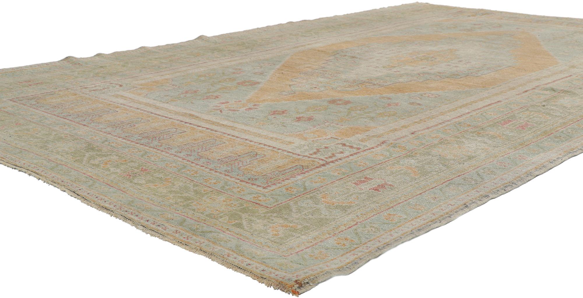 53692 Vintage Turkish Oushak Rug with Soft Earth-Tone Colors 06'00 x 10'00. Soft, bespoke vibes meet ancient traditions in this hand knotted wool vintage Turkish Oushak rug. The antique washed baby blue field features a large-scale concentric
