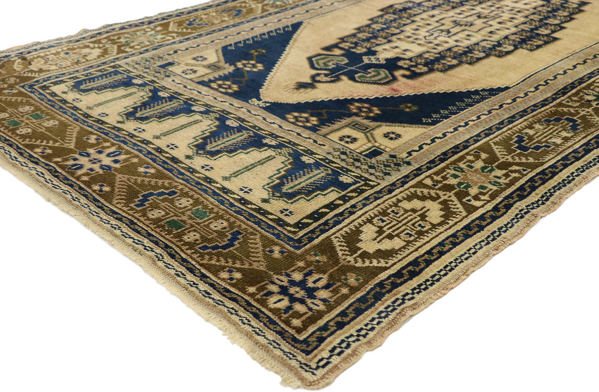 50304 vintage Turkish Oushak rug with modern Greek Mediterranean style. With its warm beige and brilliant blues inspired by modern Mediterranean vibes, this hand knotted wool vintage Turkish Oushak rug is well-balanced and poised to impress. The