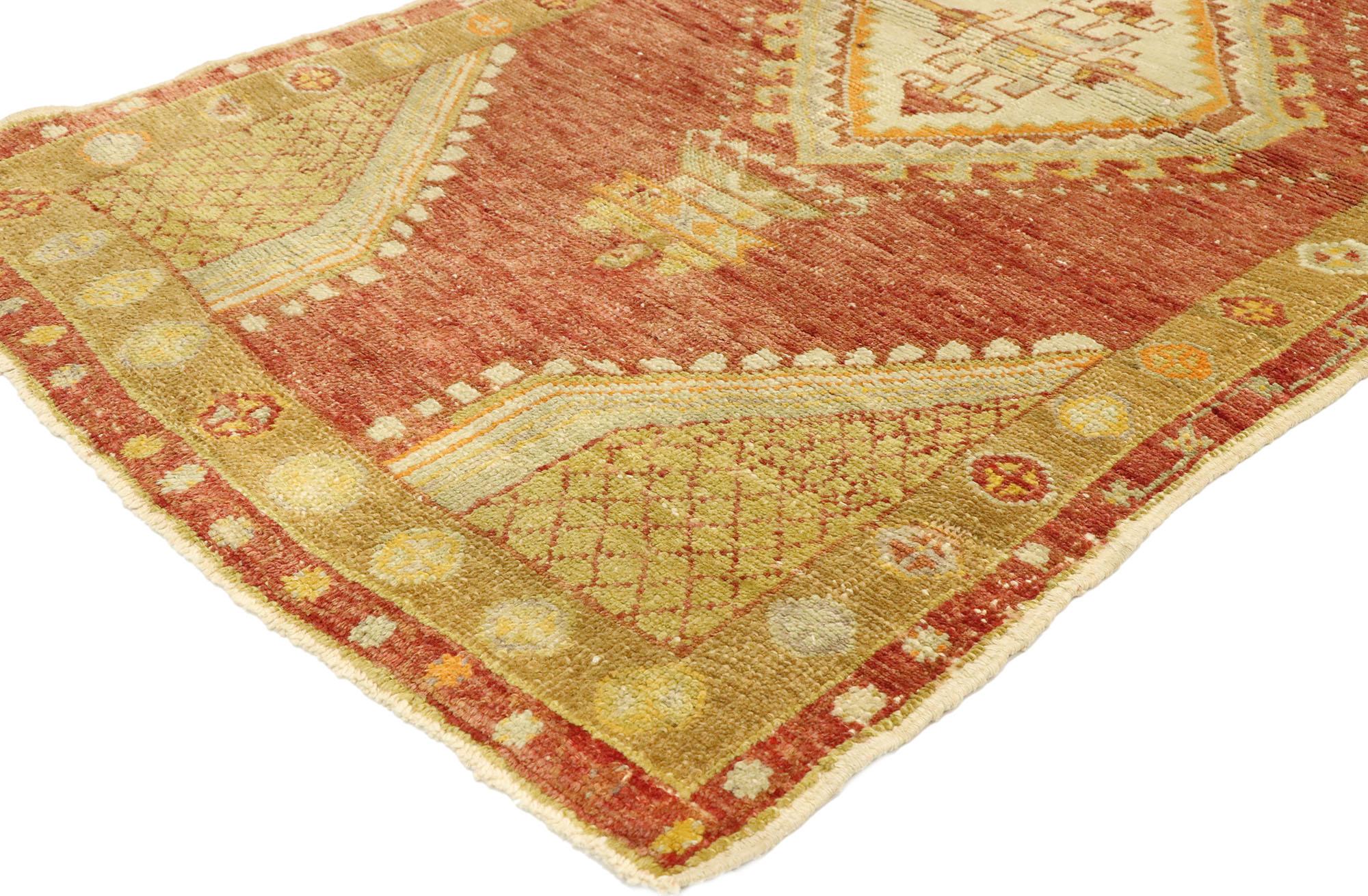 51209, vintage Turkish Oushak rug with modern rustic style 02'08 X 04'05. With vibrant colors and rustic sensibility, this hand knotted wool vintage Turkish Oushak rug is poised to impress. The abrashed field features a hooked lozenge amulet