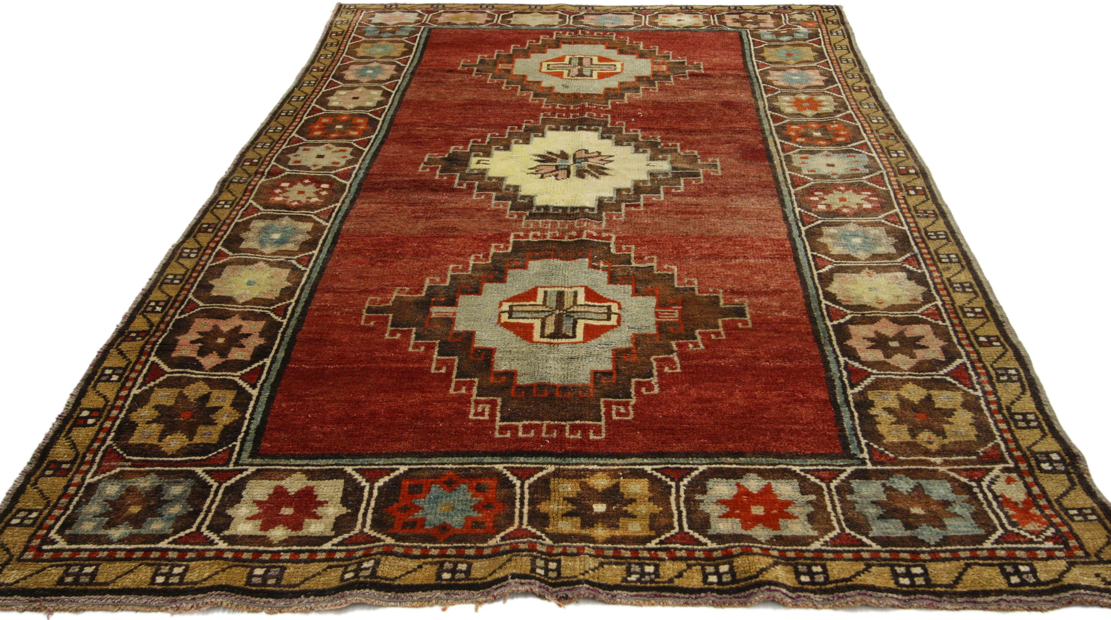 52293, vintage Turkish Oushak rug with modern style, Entry or Foyer rug. This hand-knotted wool vintage Turkish Oushak rug with modern style features three amulet latch hook medallions in an abrashed dark red field. The Oushak accent rug is framed