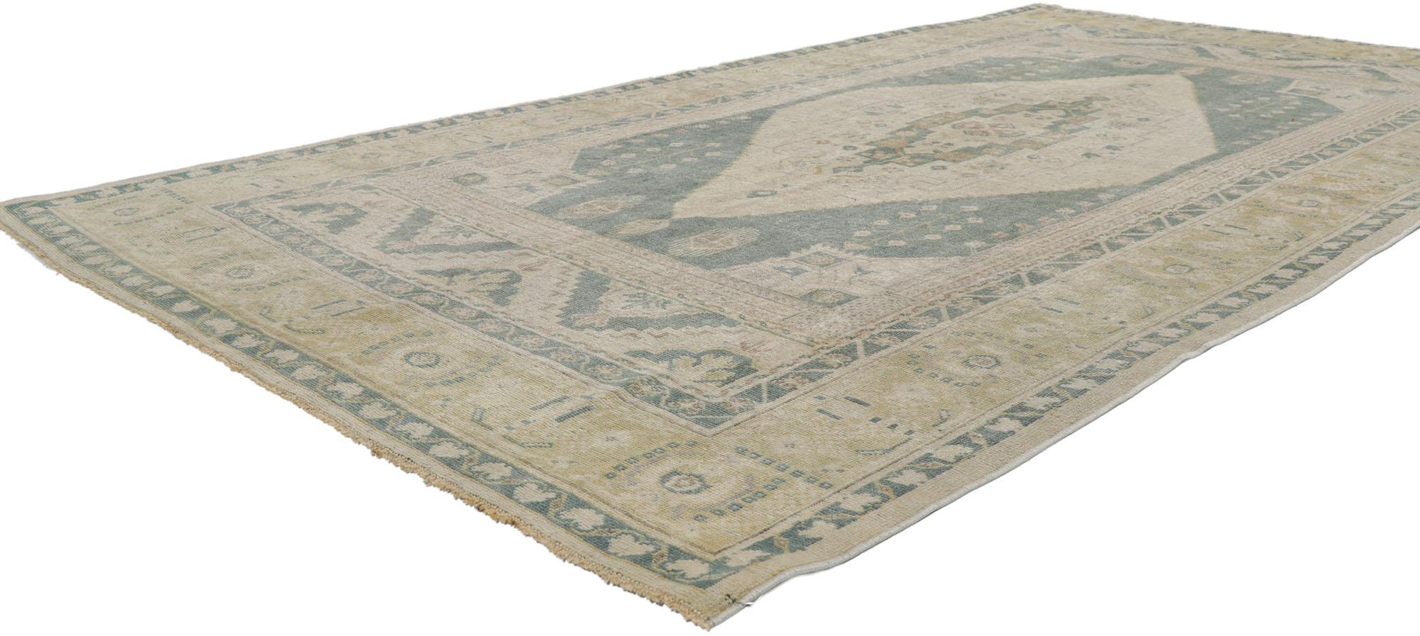 53671 Vintage Turkish Oushak Rug, 05'02 x 09'07. Indulge in the harmonious fusion of Biophilic Design and Shibui aesthetics with this hand-knotted wool vintage Turkish Oushak rug. The antique-washed cut-out field unveils an elongated hexagonal