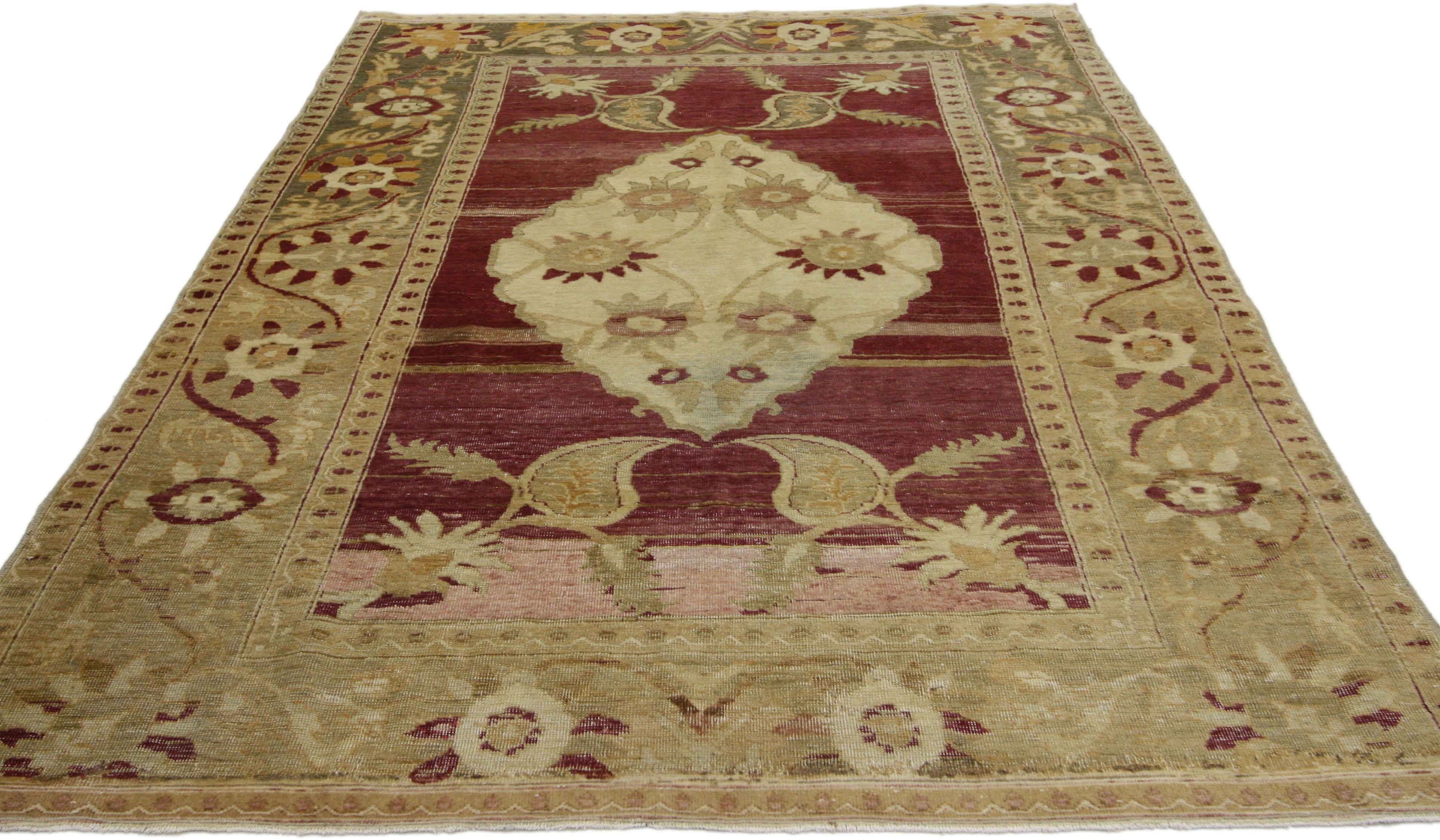 52299, vintage Turkish Oushak rug with modern tribal style, Entry or Foyer rug. This hand-knotted wool vintage Turkish Oushak rug features a lozenge medallion with scalloped edges in an abrashed field. The medallion is filled with blooming six