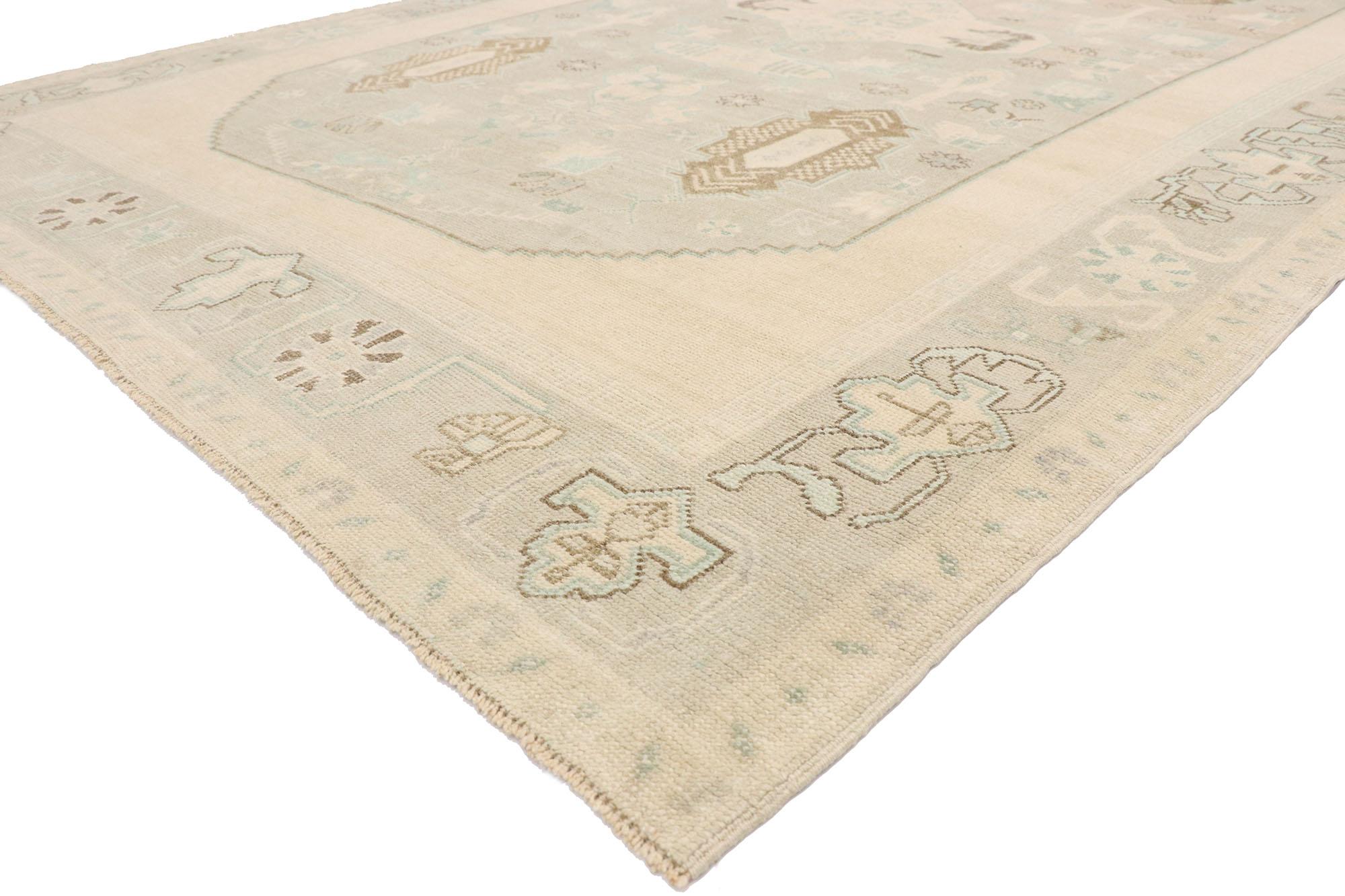 52808 Muted Vintage Turkish Oushak Rug, 06'02 x 09'07.
Take a timeless, tailored design, mix in a dash of history and antique-washed colors to get this fresh look that’s as comfortable as it is chic. This hand-knotted wool vintage Turkish Oushak rug