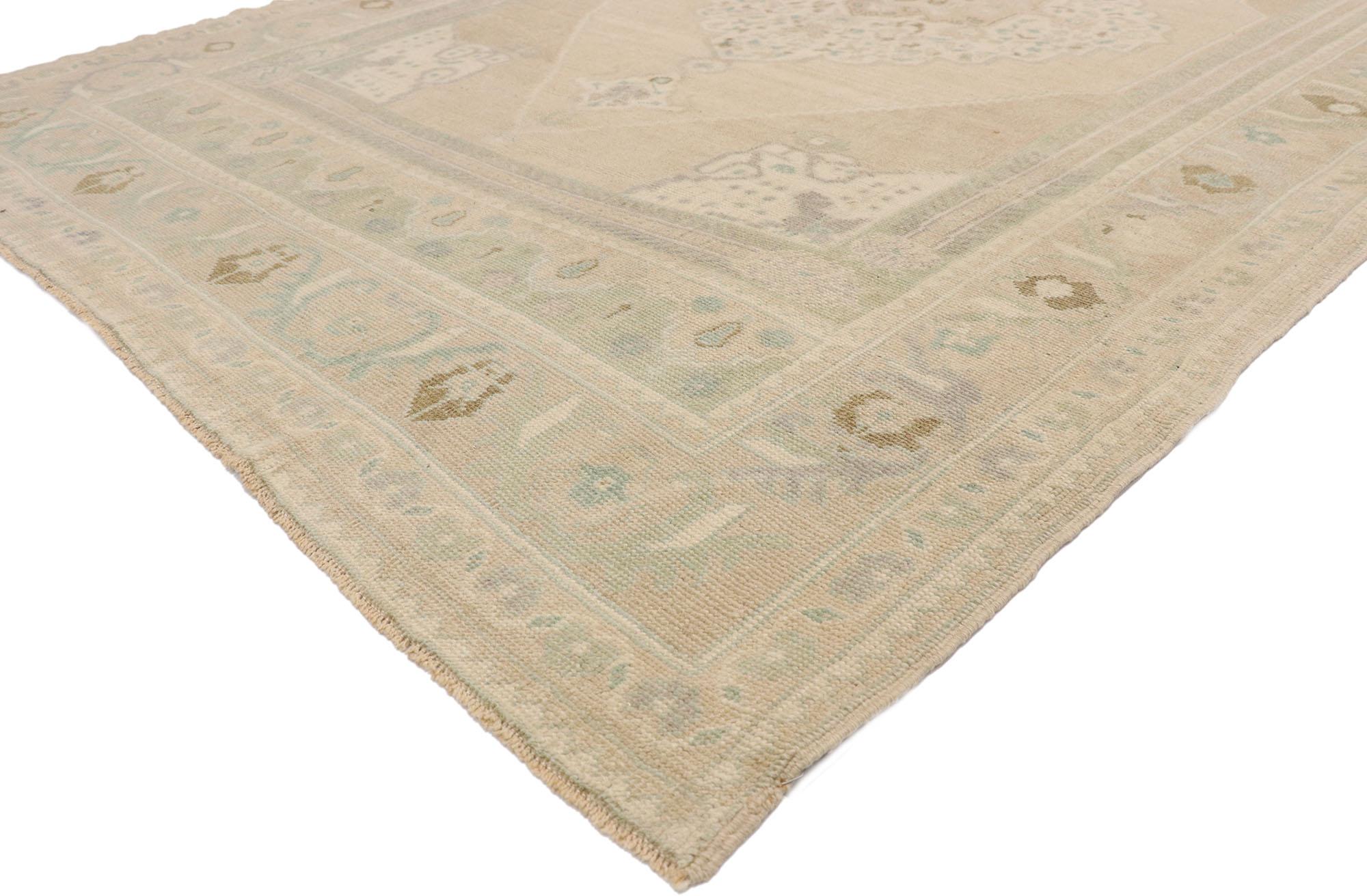 58210 Muted Vintage Turkish Oushak Rug, 05'11 x 09'04.
Quiet luxe meets calm cohension in this hand knotted wool vintage Turkish Oushak rug. The intricate botanical design and soft earth-tone colors woven into this piece work together creating an