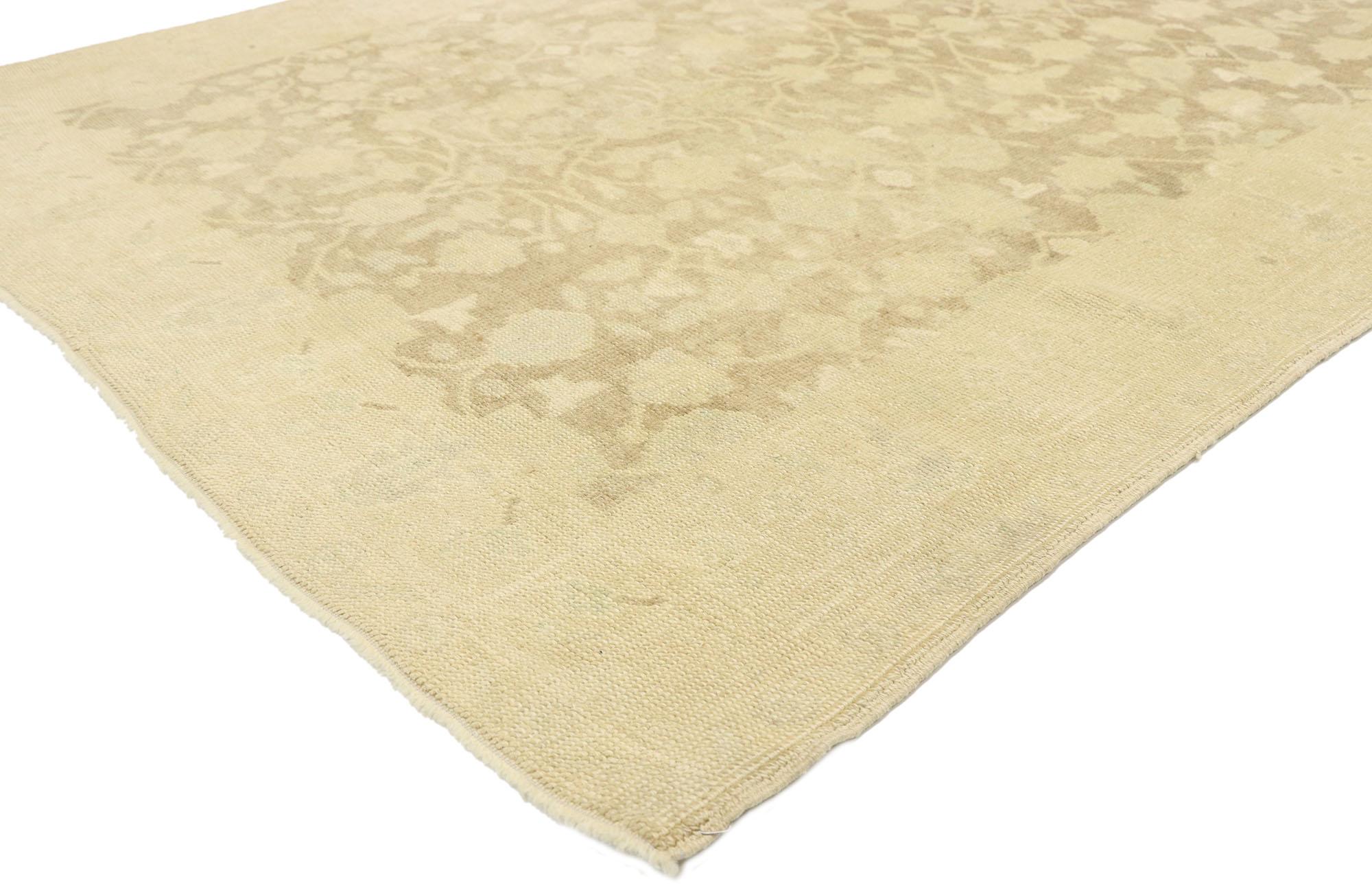 53018, vintage Turkish Oushak rug with monochromatic mission style. Emanating sophistication and grace, this hand knotted wool vintage Turkish Oushak rug provides an elegant and genteel design aesthetic with soft subtle hues. The abrashed antique