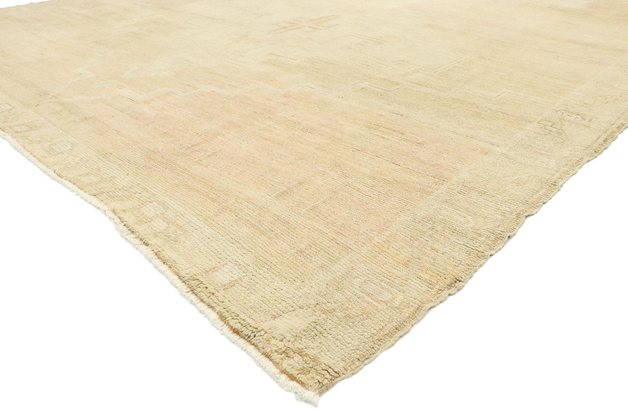 53037 vintage Turkish Oushak rug with Monochromatic Mission style. Effortless beauty and simplicity meet soft, bespoke vibes with a monochromatic Mission style in this hand knotted wool vintage Turkish Oushak rug. The abrashed cutout field features