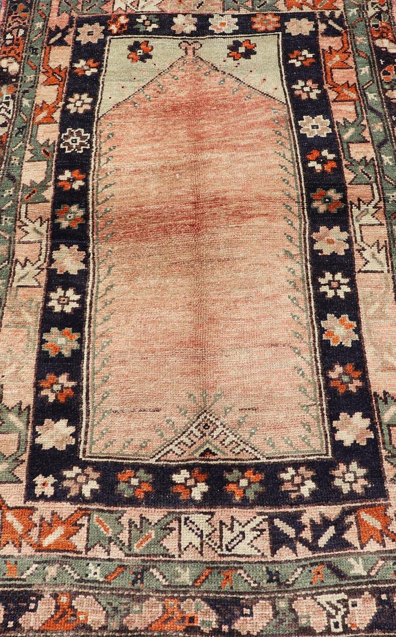 Wool Vintage Turkish Oushak Rug with Multiple Defining Borders of Geometric Florals For Sale