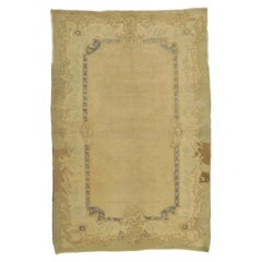 Vintage Turkish Oushak Rug with Muted Earth-Tone Colors