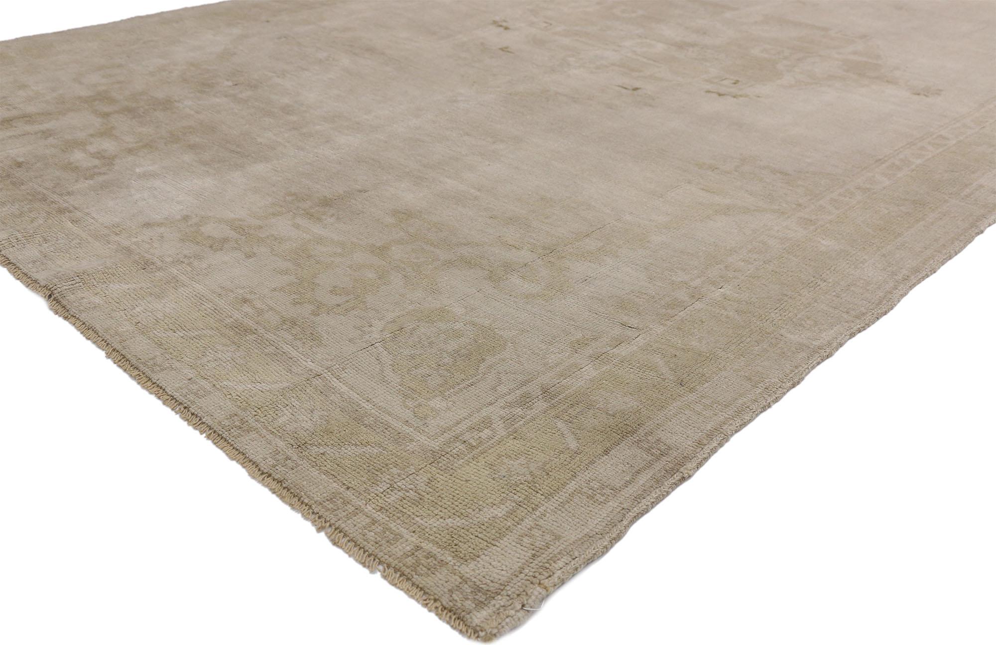 52477, Vintage Turkish Oushak Rug with Rustic American Colonial Style. Showcasing timeless elegance in a muted color palette this hand knotted wool Vintage Turkish Oushak rug features a demure center medallion with elaborate spandrels in shades of