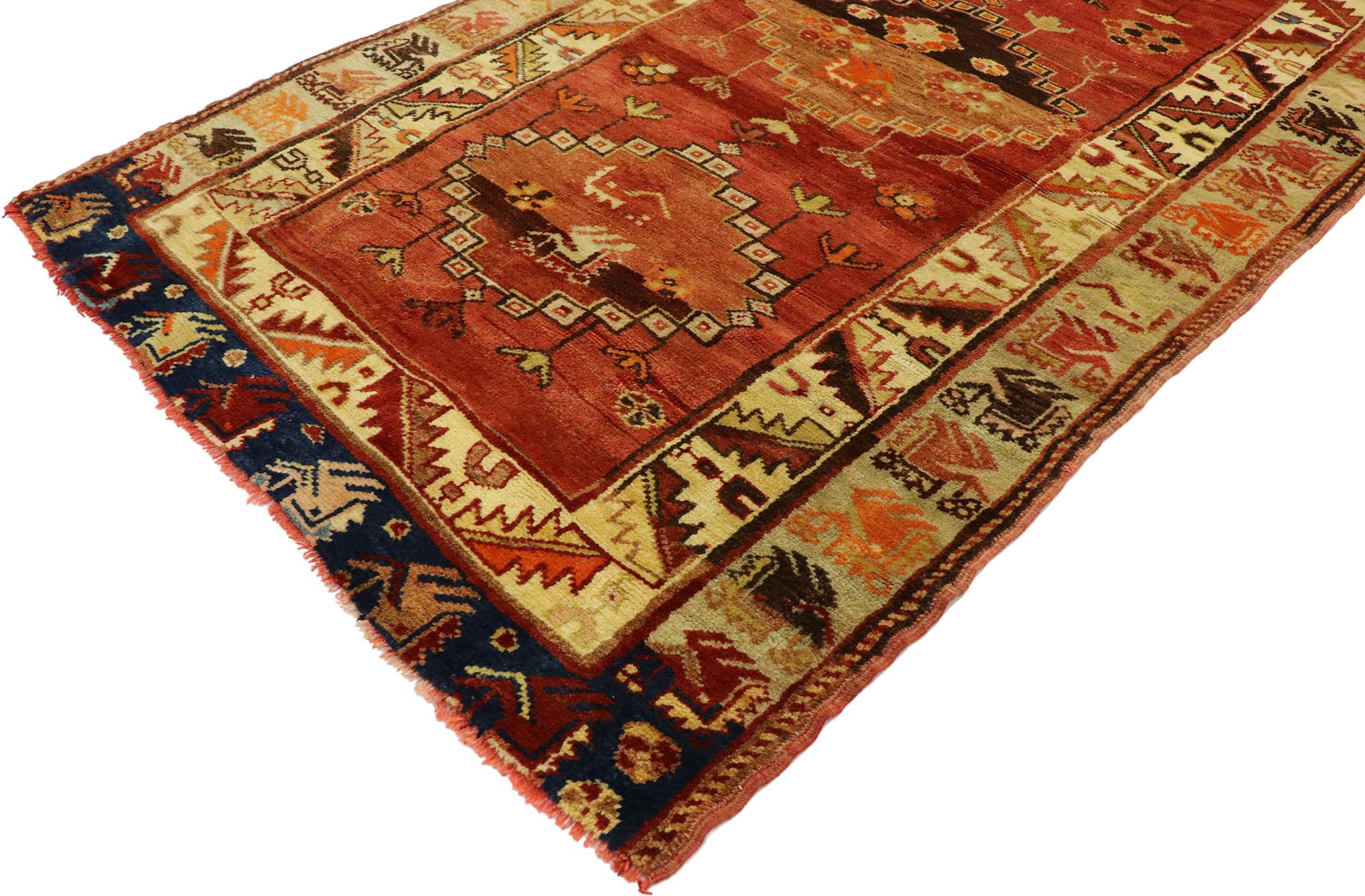 53096 Vintage Turkish Oushak Rug, ​03'07 x 06'04.
​Step into a world of tribal enchantment and nomadic charm with this hand knotted vintage Turkish Oushak rug. Every inch is a woven masterpiece, with a striking tribal design and energetic earthy