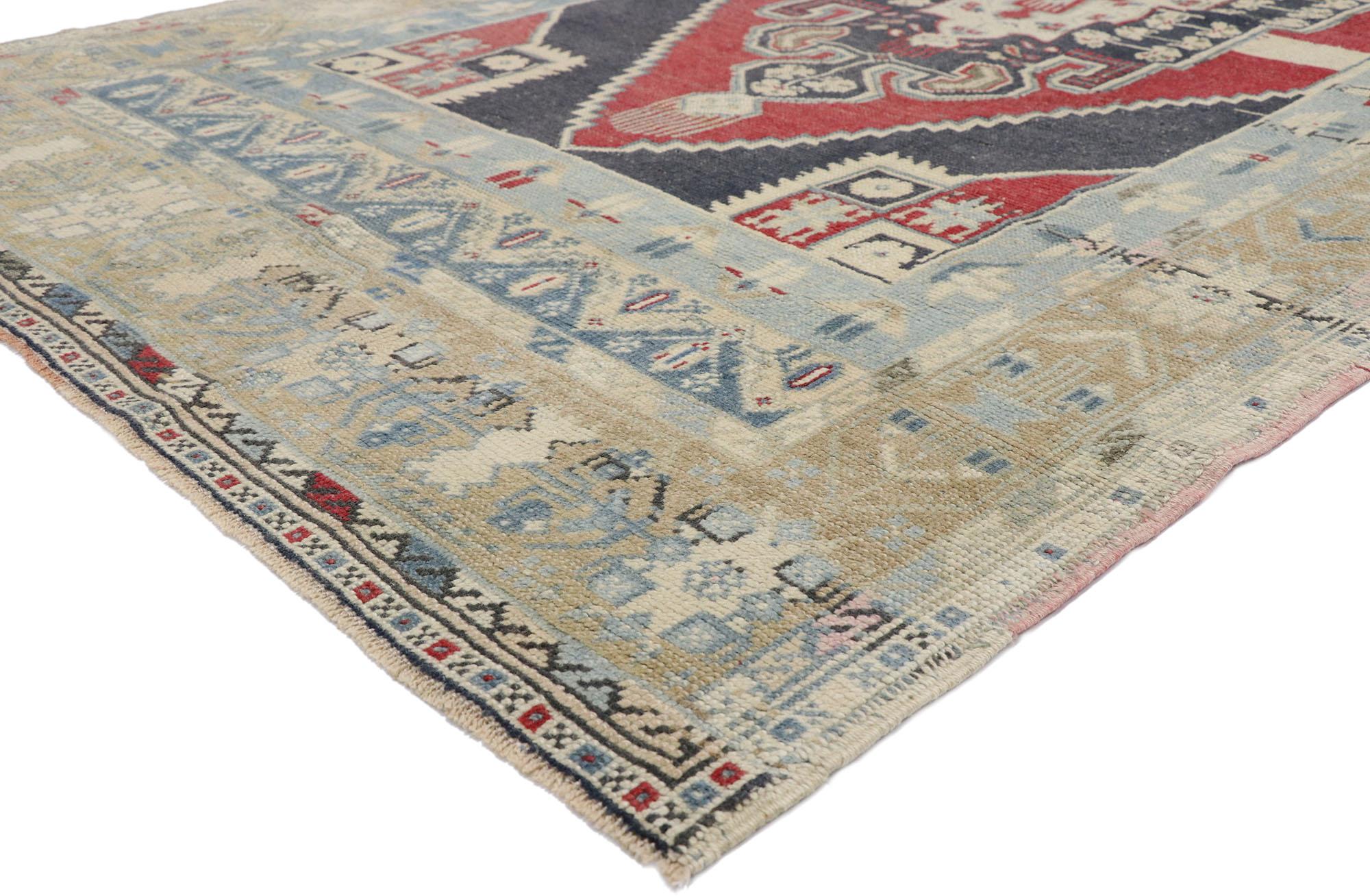 52674, vintage Turkish Oushak rug with relaxed Federal style. With timeless appeal, refined colors, and architectural design elements, this hand knotted wool vintage Turkish Oushak rug can beautifully blend contemporary and traditional interiors. It