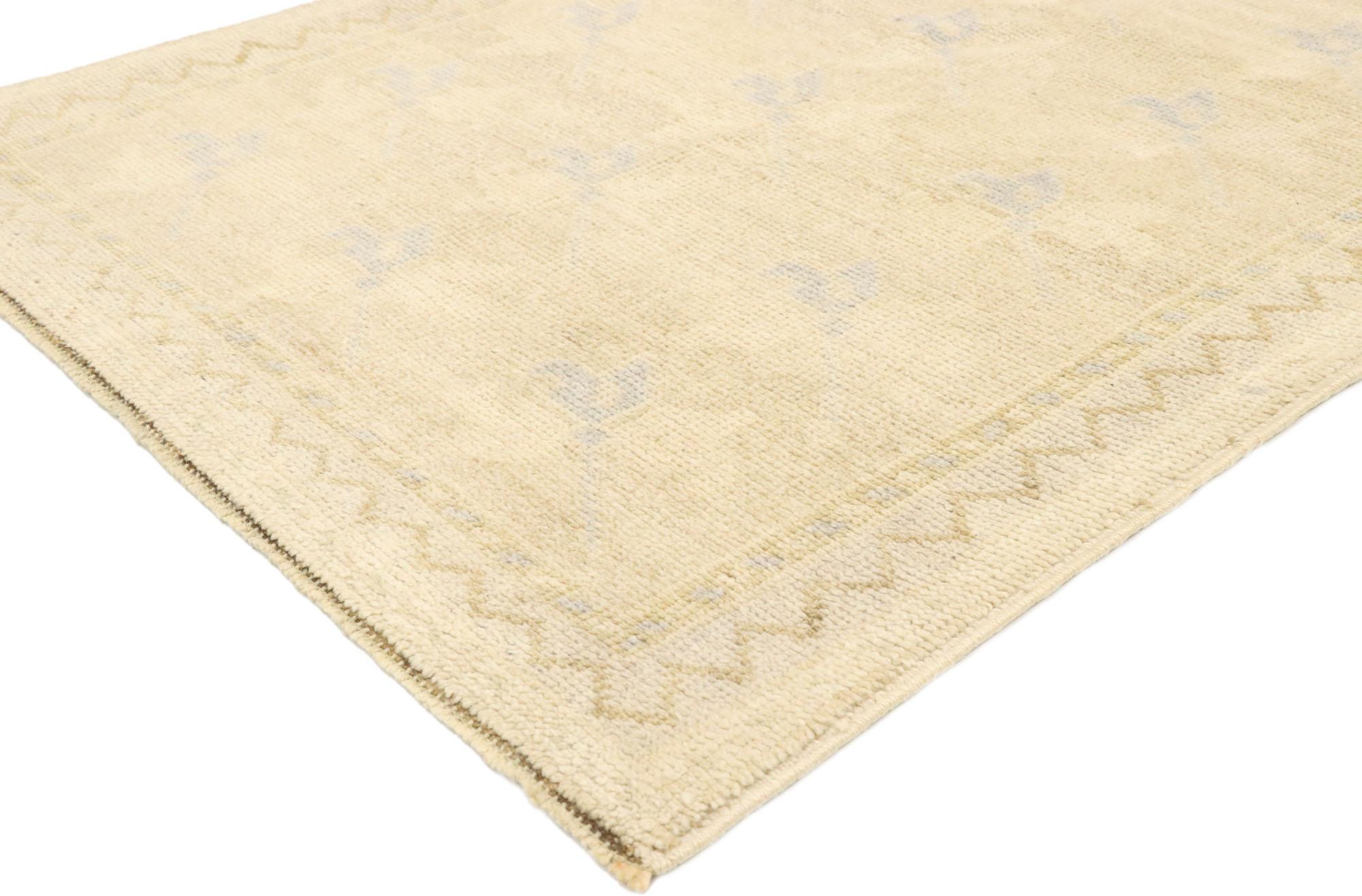 52936, vintage Turkish Oushak rug with romantic farmhouse Georgian cottage style. Soft, bespoke vibes meet romantic farmhouse Georgian cottage style in this hand knotted wool vintage Turkish Oushak rug. The champagne-beige antique washed field