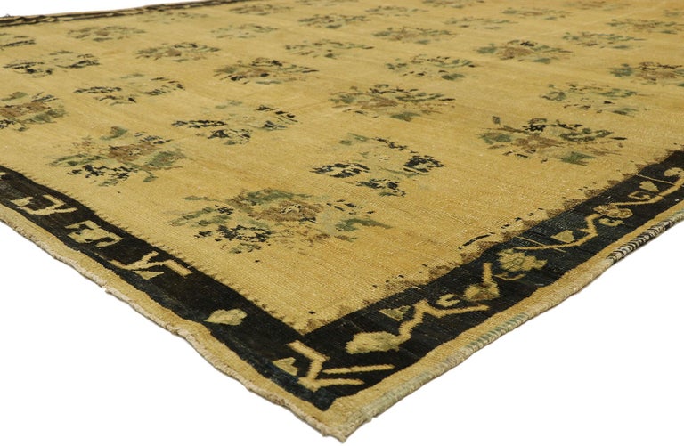 51387 Vintage Turkish Oushak rug with Romantic French Country Cottage style 09'03 x 13'00. Rustic and refined, this hand knotted wool vintage Turkish Oushak rug beautifully embodies romantic French Country style. The field is covered with an