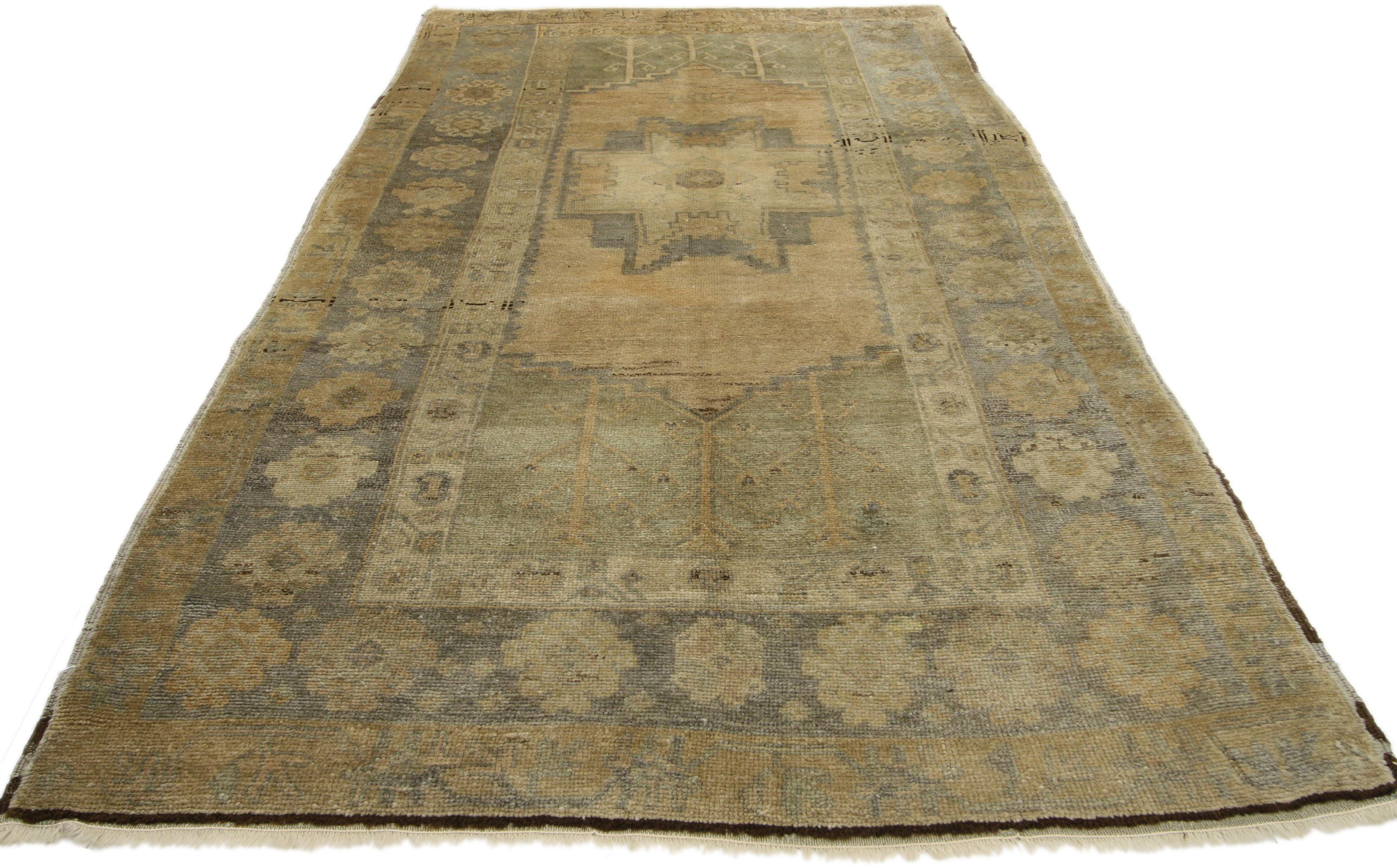 73638, vintage Turkish Oushak rug with rustic American Colonial style, short hallway runner. This hand knotted wool vintage Turkish Oushak rug features a stepped geometric central medallion- a variation of the Lesghi star motif symbolizing