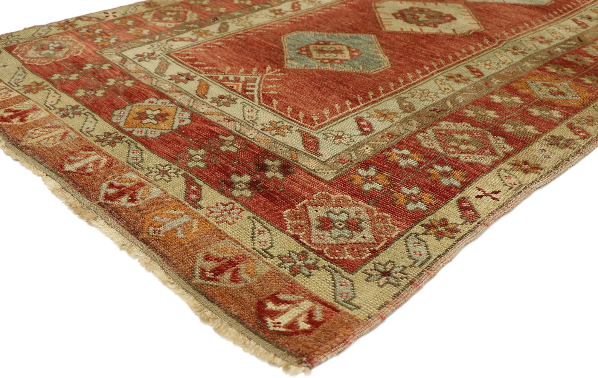 50916 vintage Turkish Oushak rug with Rustic Artisan Spanish Colonial style. Warm and inviting, this hand knotted wool vintage Turkish Oushak rug features three hexagonal medallions spread across an abrashed brick red field. It is enclosed with a