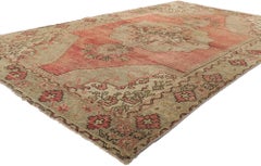 Türkischer Oushak-Teppich im Vintage-Stil mit rustikalen erdfarbenen Farben