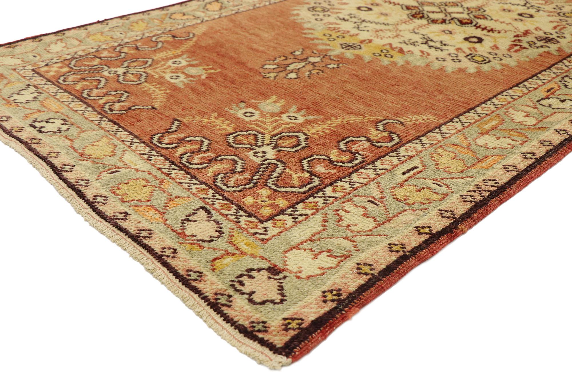 50655 vintage Turkish Oushak rug with Rustic French Rococo style. Balancing rustic sensibility with romantic connotations, this hand knotted wool vintage Turkish Oushak rug beautifully embodies a French Rococo vibes. The abrashed terra cotta field
