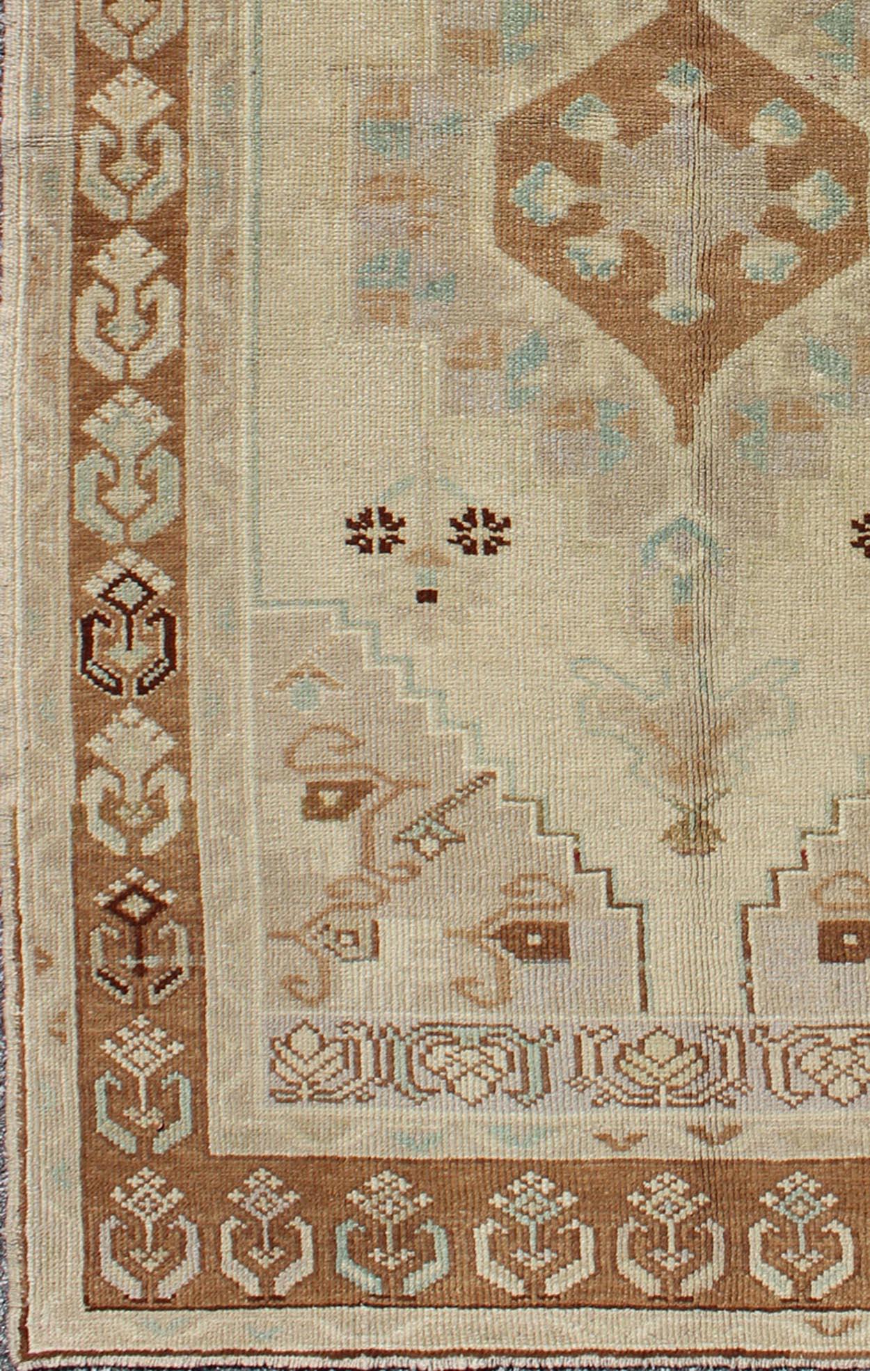 20th Century Vintage Turkish Oushak Rug with Soft Beige, Muted Blue, and Warm Brown 3'4 x 6'2 For Sale
