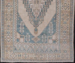 Vintage Turkish Oushak Rug with Soft Ivory and Aqua Blue Geometric Medallion