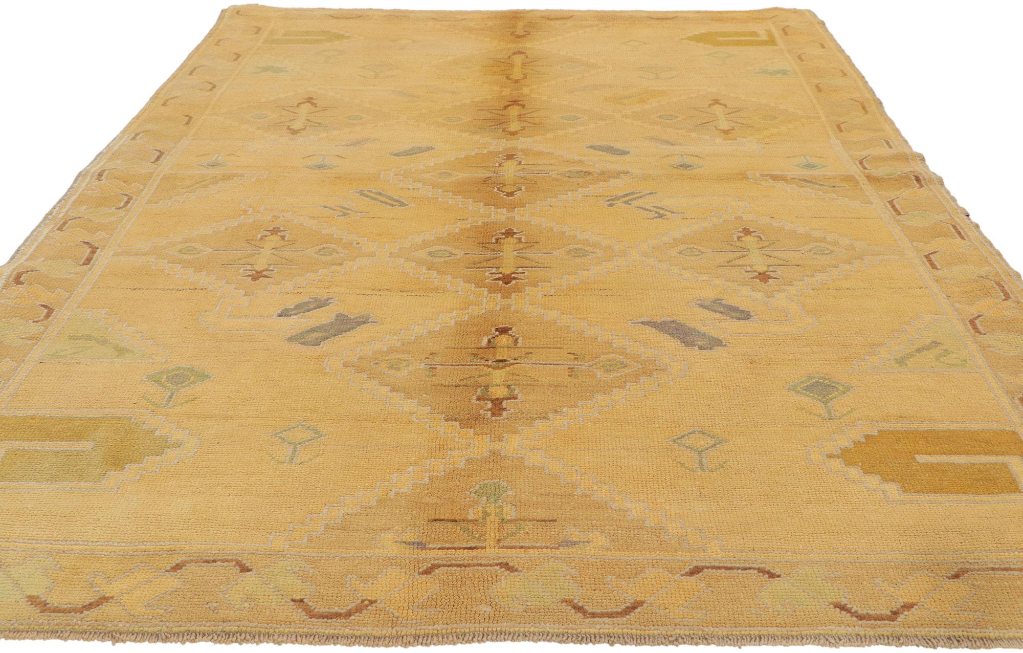 Hand-Knotted Vintage Turkish Oushak Rug with Soft Pastel Earth-Tone Colors For Sale