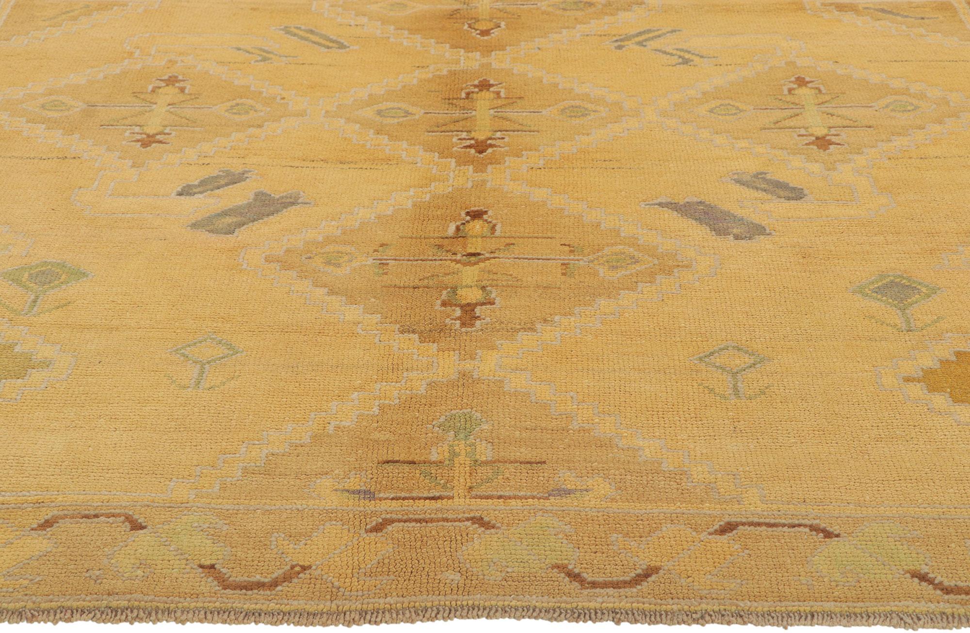 20th Century Vintage Turkish Oushak Rug with Soft Pastel Earth-Tone Colors For Sale