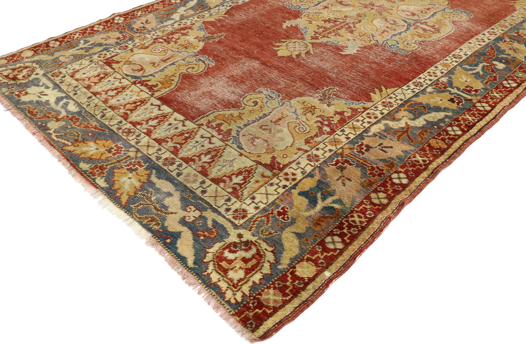 53149, vintage Turkish Oushak rug with southern living neoclassical style. Lovingly timeworn with timeless design rustic sensibility, this hand-knotted wool distressed vintage Turkish Oushak rug beautifully embodies Southern Living Neoclassical