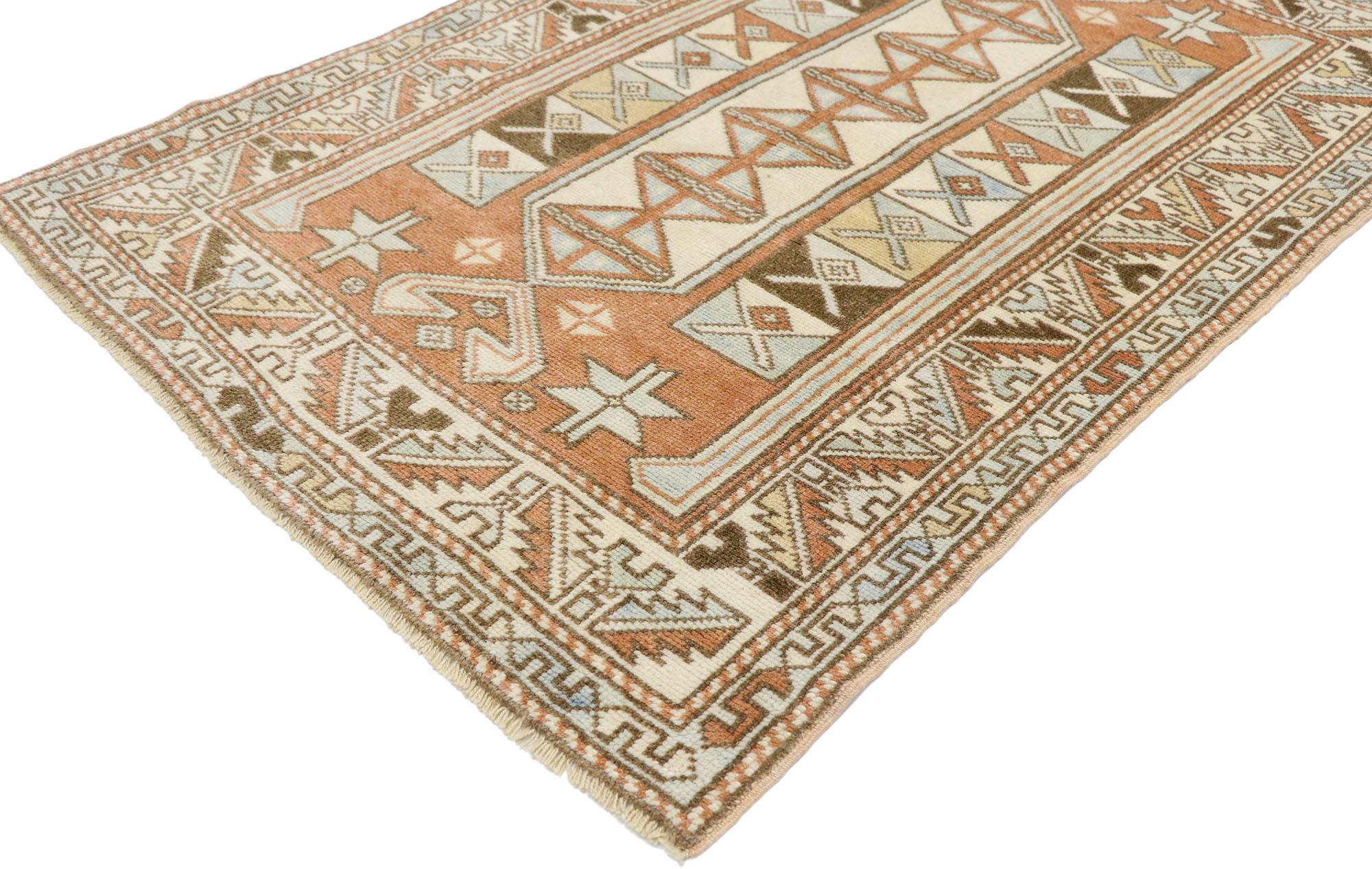 53522, vintage Turkish Oushak rug with southwestern tribal style 02'10 x 04'03. Full of tiny details and a bold expressive design combined with exuberant colors and Southwestern style, this hand-knotted wool vintage Turkish Oushak rug is a
