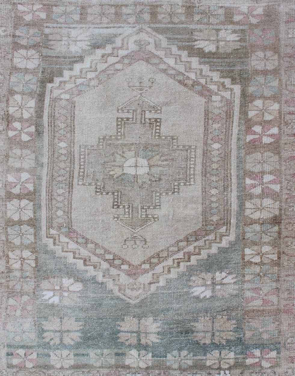 Vintage Turkish Oushak Rug with Stylized Medallion in Soft Green and Creams In Good Condition In Atlanta, GA