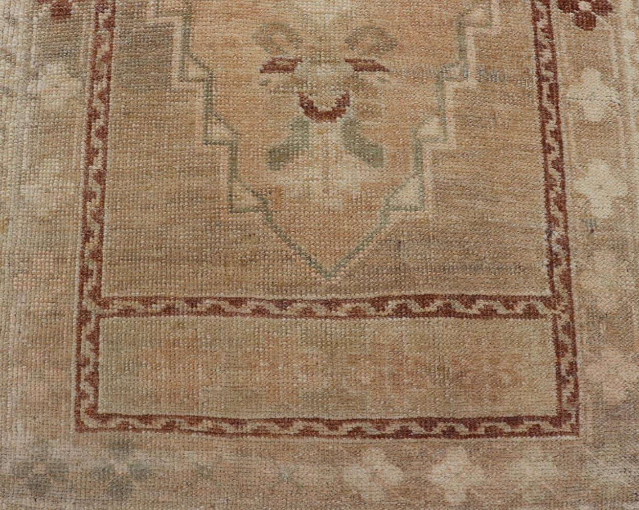 Hand-Knotted Vintage Turkish Oushak Rug with Sub-Geometric Medallion Design & Neutral colors For Sale