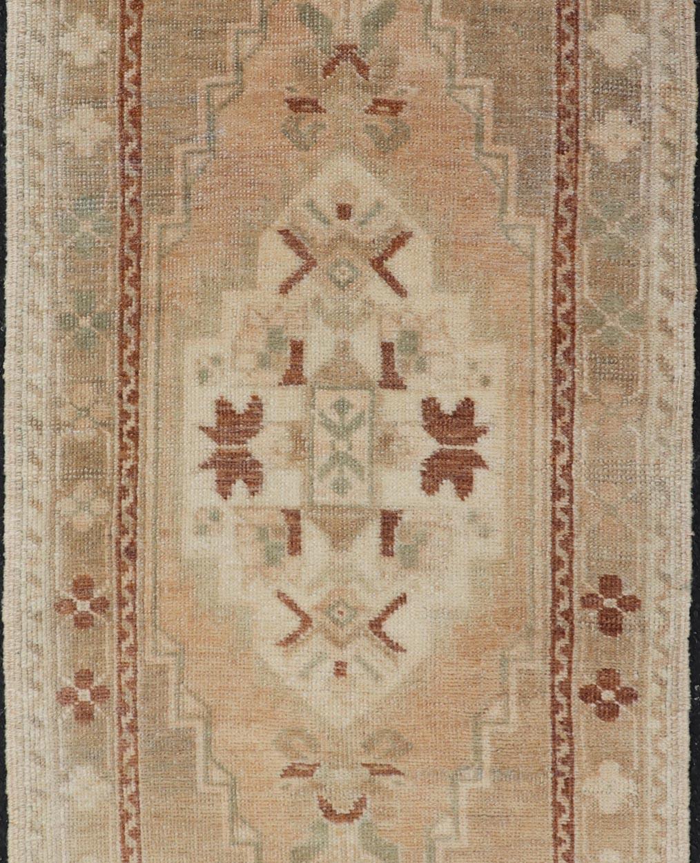 Wool Vintage Turkish Oushak Rug with Sub-Geometric Medallion Design & Neutral colors For Sale