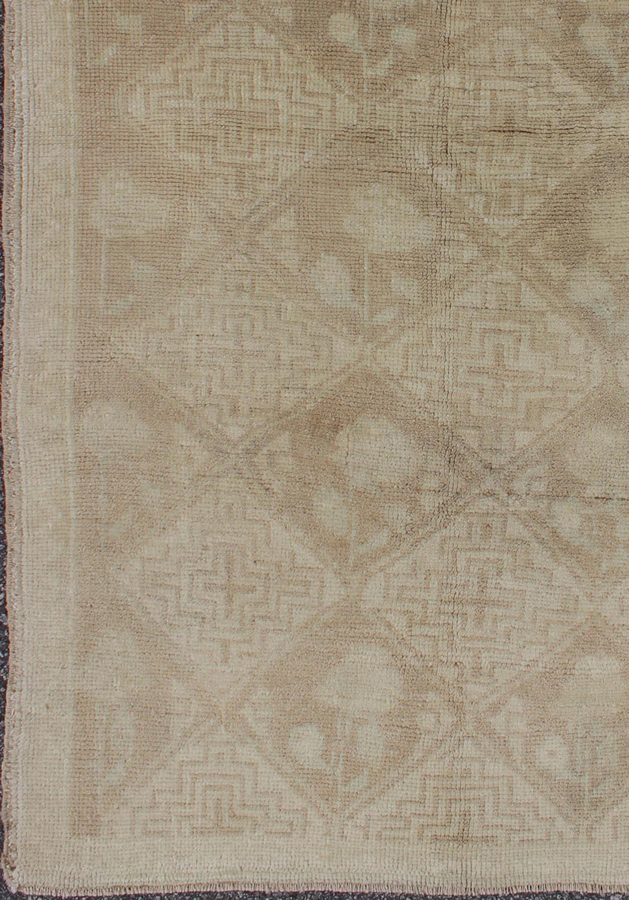 20th Century Vintage Turkish Oushak Rug with Subtle Geometric and Floral Motifs 3'2 x 5'6 For Sale