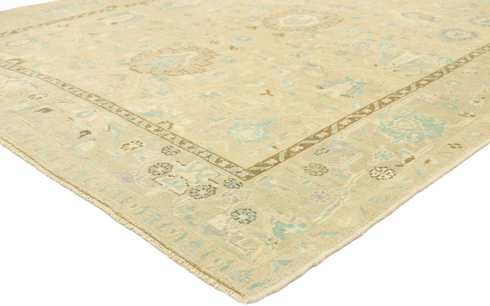 52959 vintage Turkish Oushak rug with Swedish Gustavian Cottage style. Balancing Swedish simplicity with Gustavian grace, this hand knotted wool vintage Turkish Oushak rug displays nostalgic charm and inimitable warmth. The abrashed tan-ecru field