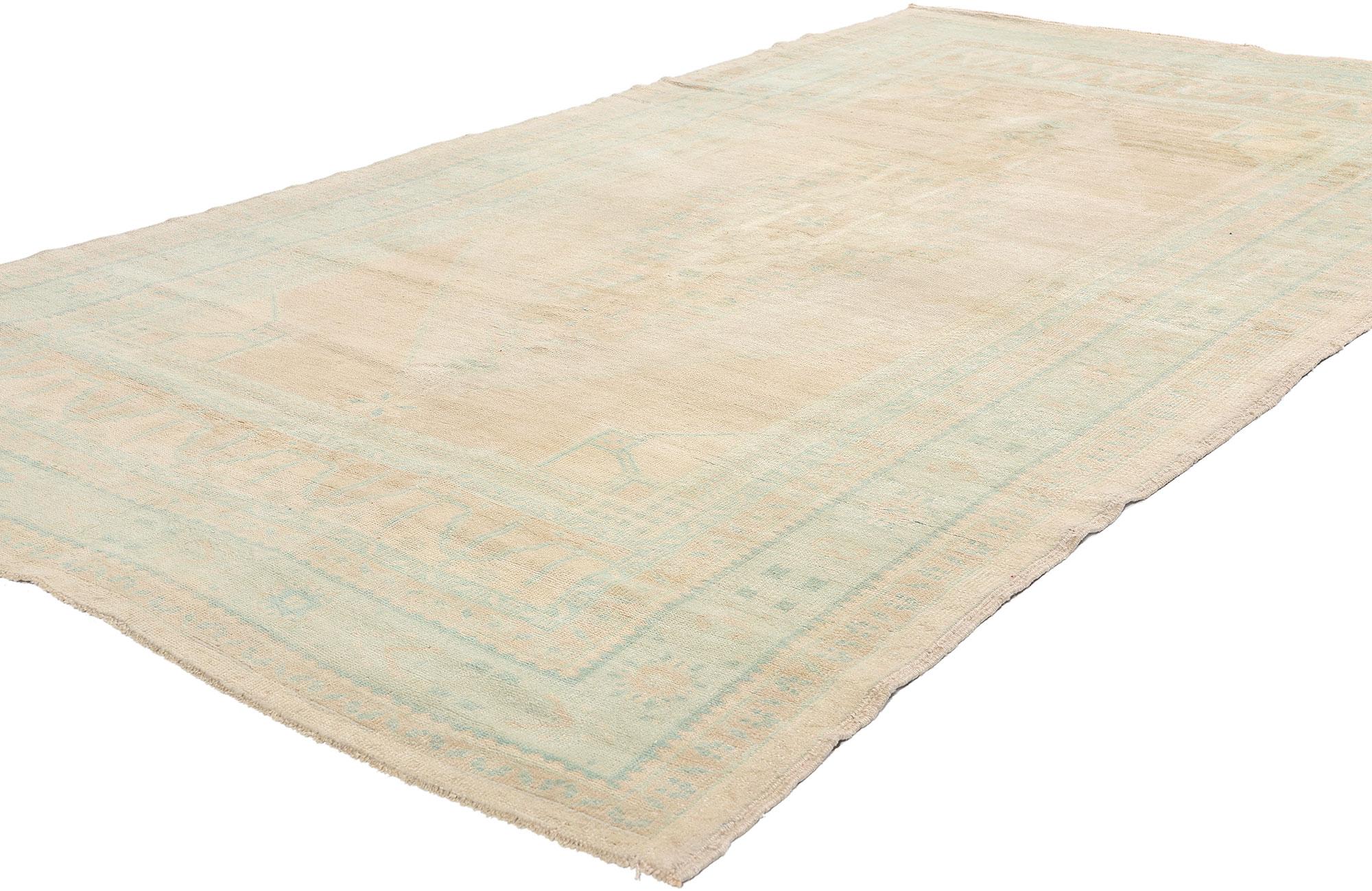 53559 Vintage Muted Turkish Oushak Rug, 05'03 x 09'03. Bathed in an ethereal hush of sunlit sand and dew-washed celadon, this hand-knotted wool vintage Turkish Oushak rug whispers a quiet poetry that transcends time. The softly abrashed field evokes