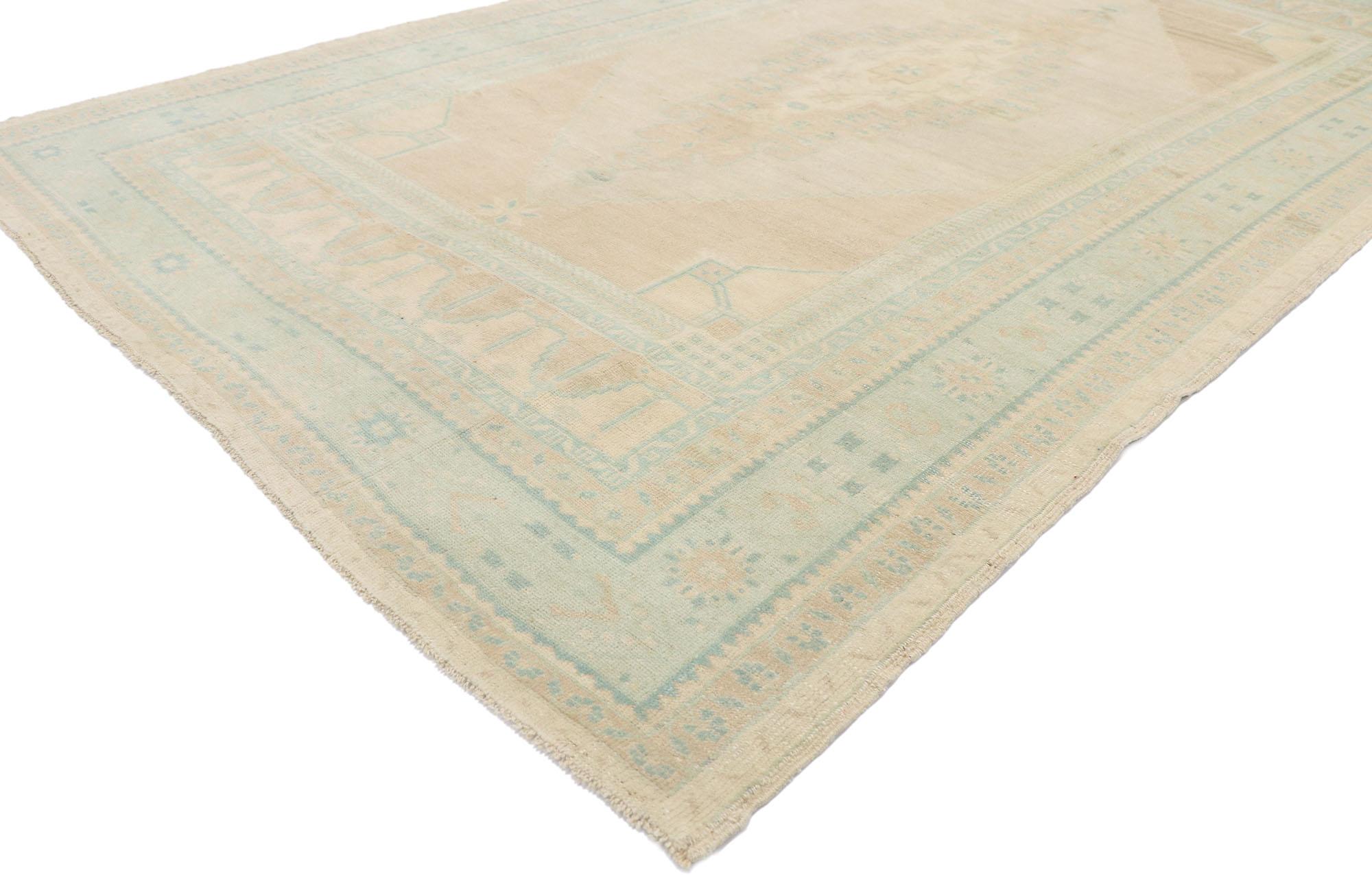 53559, vintage Turkish Oushak rug with Swedish Gustavian style. Drawing inspiration from Swedish simplicity and Gustavian grace, this hand knotted wool Turkish Oushak rug displays nostalgic charm and inimitable warmth. The abrashed tan field