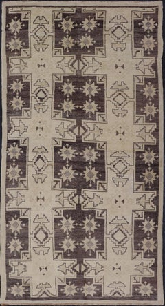 Vintage Turkish Oushak Rug with Symmetrical Geometric Elements