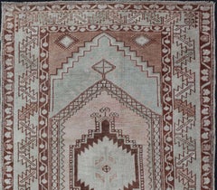 Vintage Turkish Oushak Rug with Traditional Design in Muted Blue, Brown, Salmon
